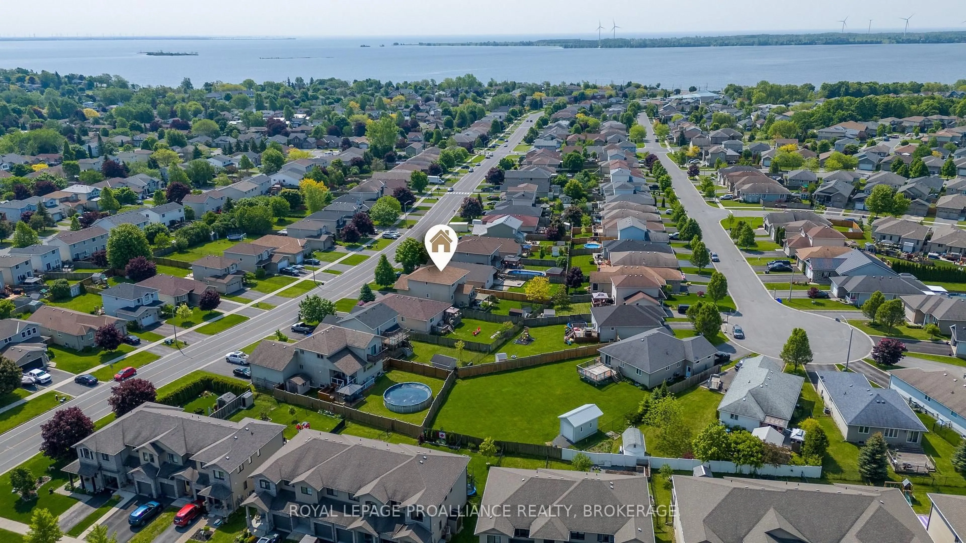 A pic from outside/outdoor area/front of a property/back of a property/a pic from drone, water/lake/river/ocean view for 174 Speers Blvd, Loyalist Ontario K7N 1Y7