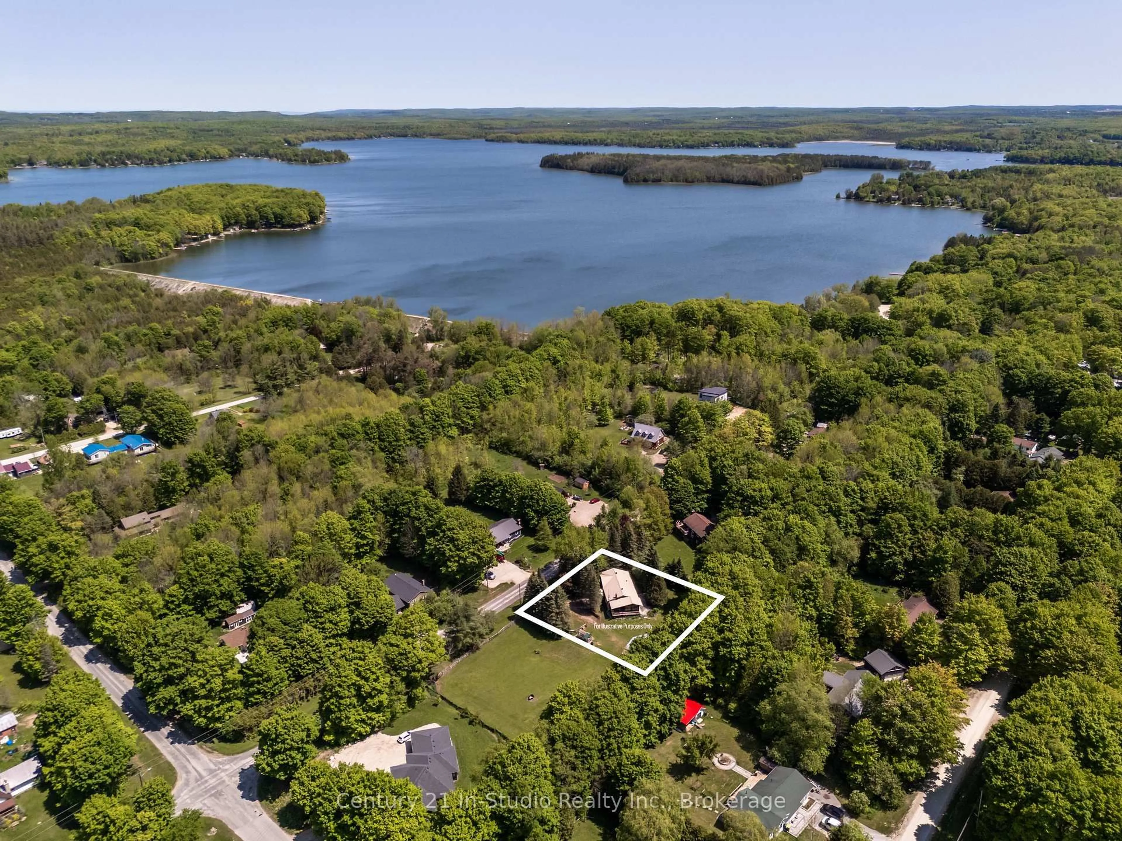 A pic from outside/outdoor area/front of a property/back of a property/a pic from drone, water/lake/river/ocean view for 212 Canrobert St, Grey Highlands Ontario N0C 1E0