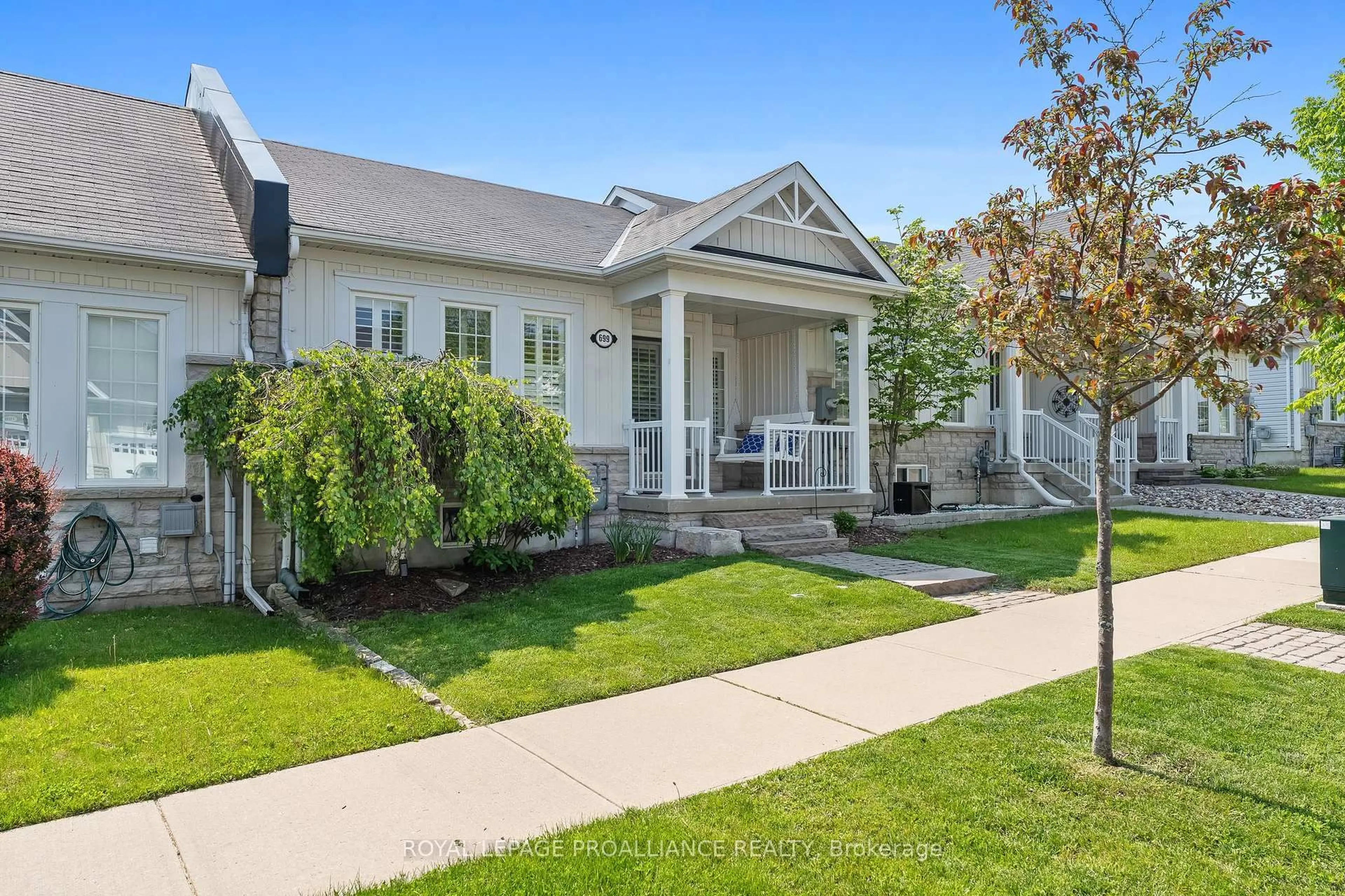 Home with vinyl exterior material, street for 699 Henderson Dr, Cobourg Ontario K9A 0J1
