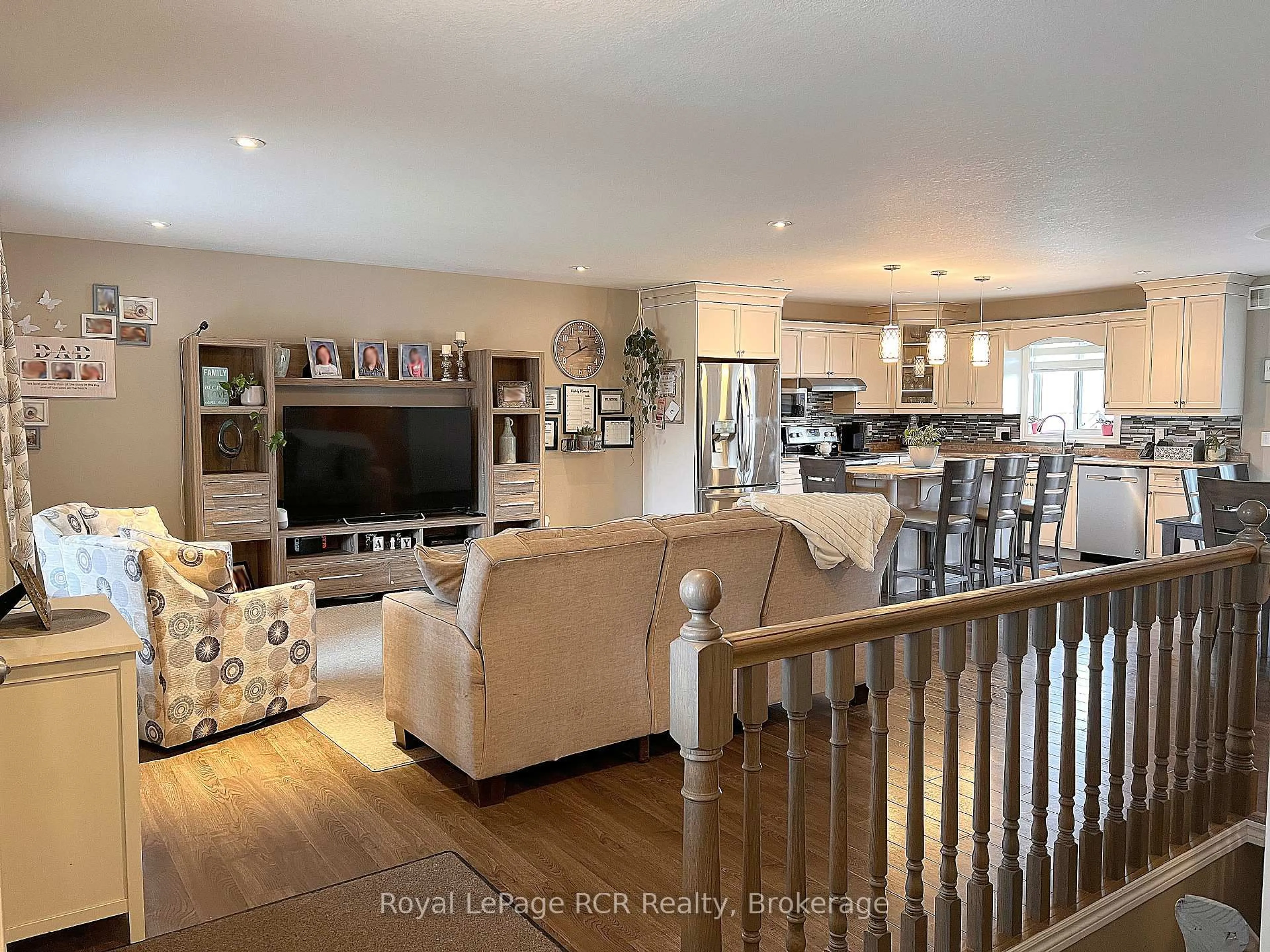 Living room with furniture, wood/laminate floor for 681 23rd Ave, Hanover Ontario N4N 3X4