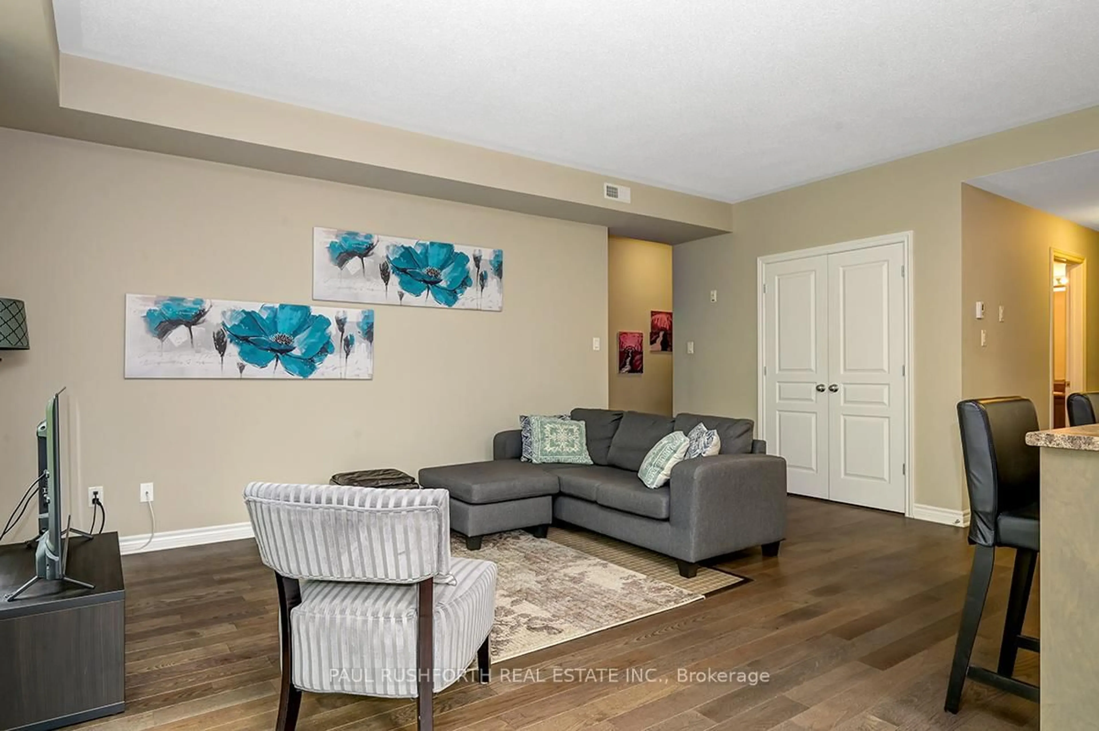 Living room with furniture, unknown for 21 Tadley Private #F, Ottawa Ontario K2J 2T3