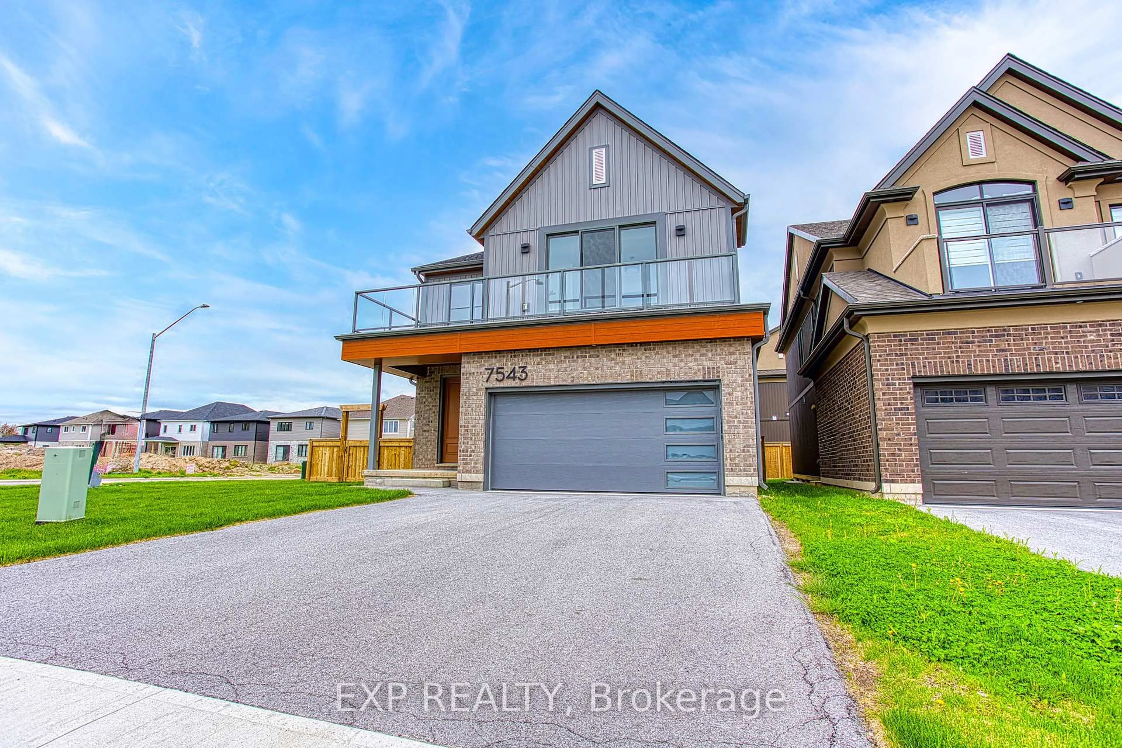 Home with brick exterior material, street for 7543 Splendour Dr, Niagara Falls Ontario L2H 3V8