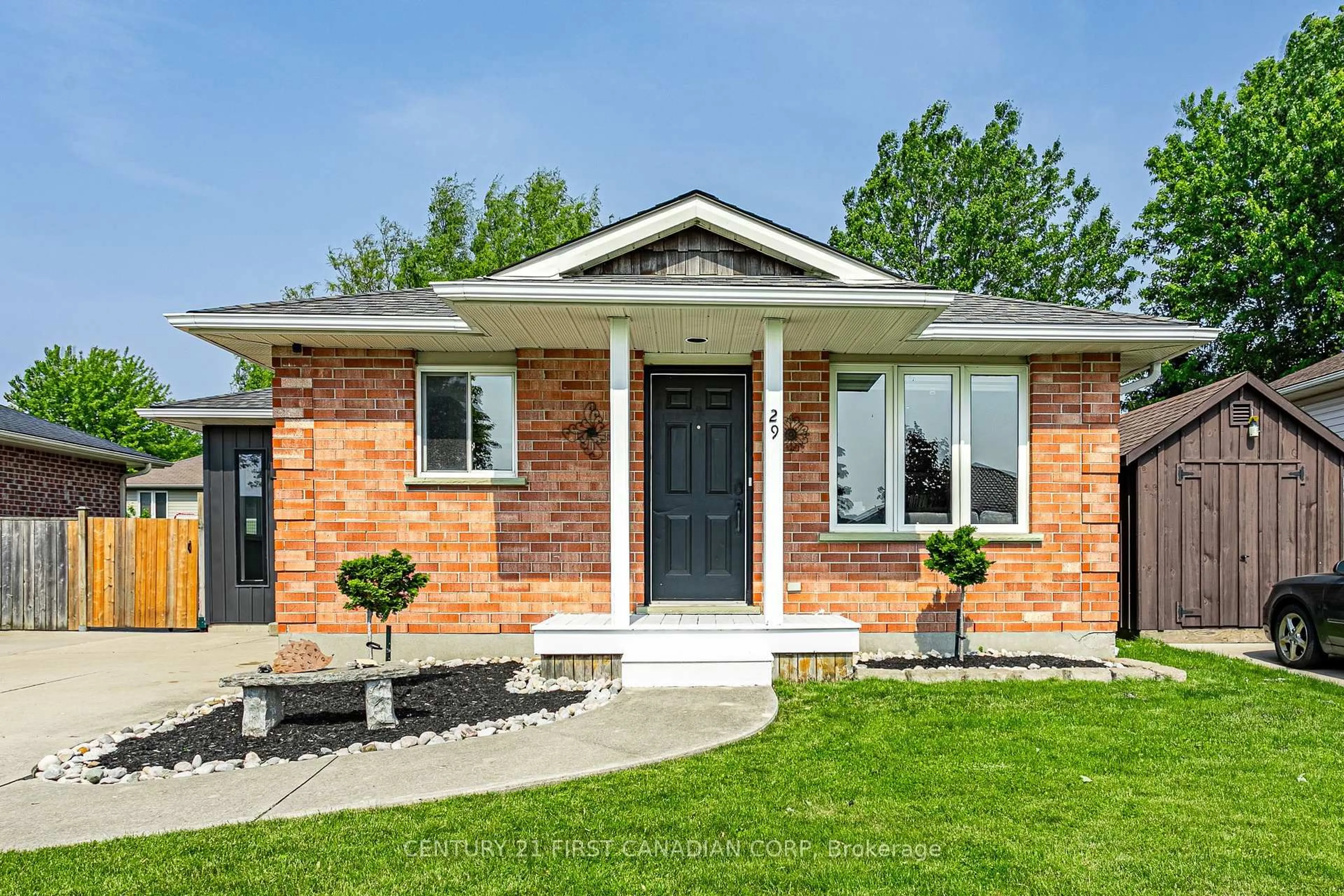 Home with brick exterior material, street for 29 Robin St, North Middlesex Ontario N0M 1A0