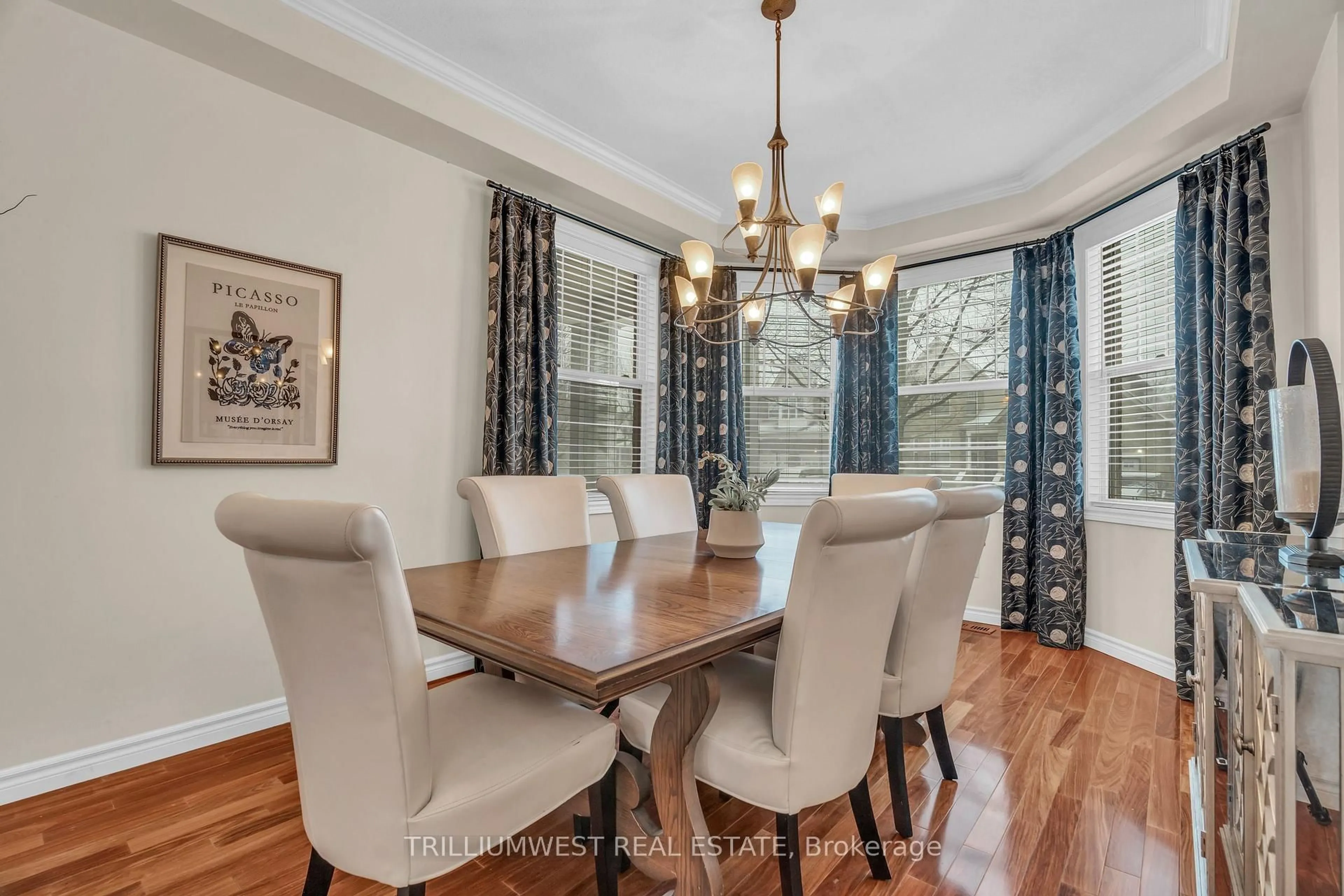 Dining room, wood/laminate floor for 31 Coopershawk St, Kitchener Ontario N2K 4J7