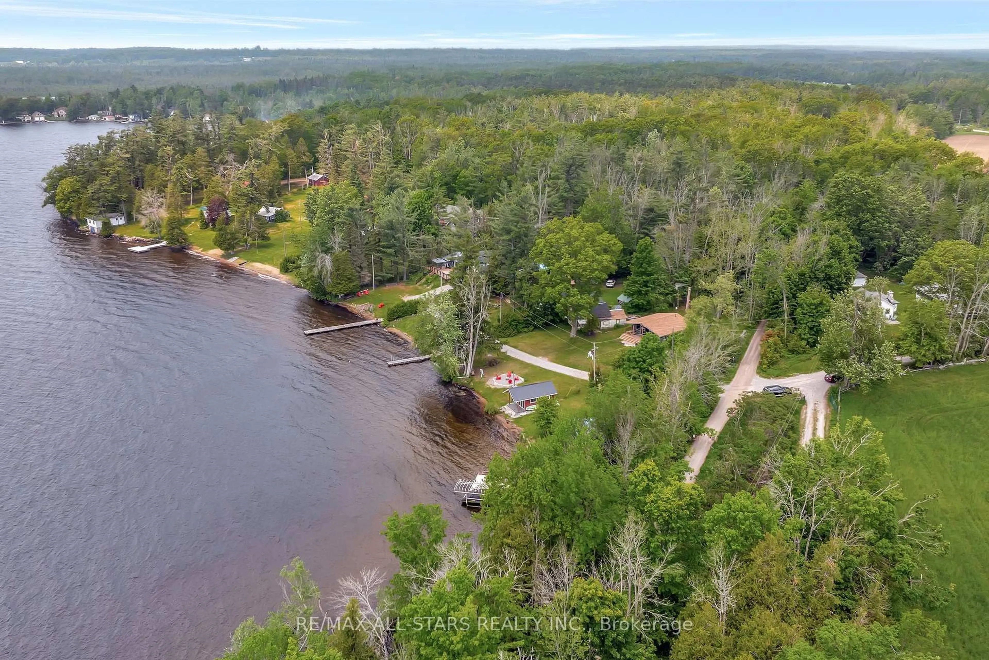A pic from outside/outdoor area/front of a property/back of a property/a pic from drone, water/lake/river/ocean view for 36 Walnut St, Kawartha Lakes Ontario K0M 1N0