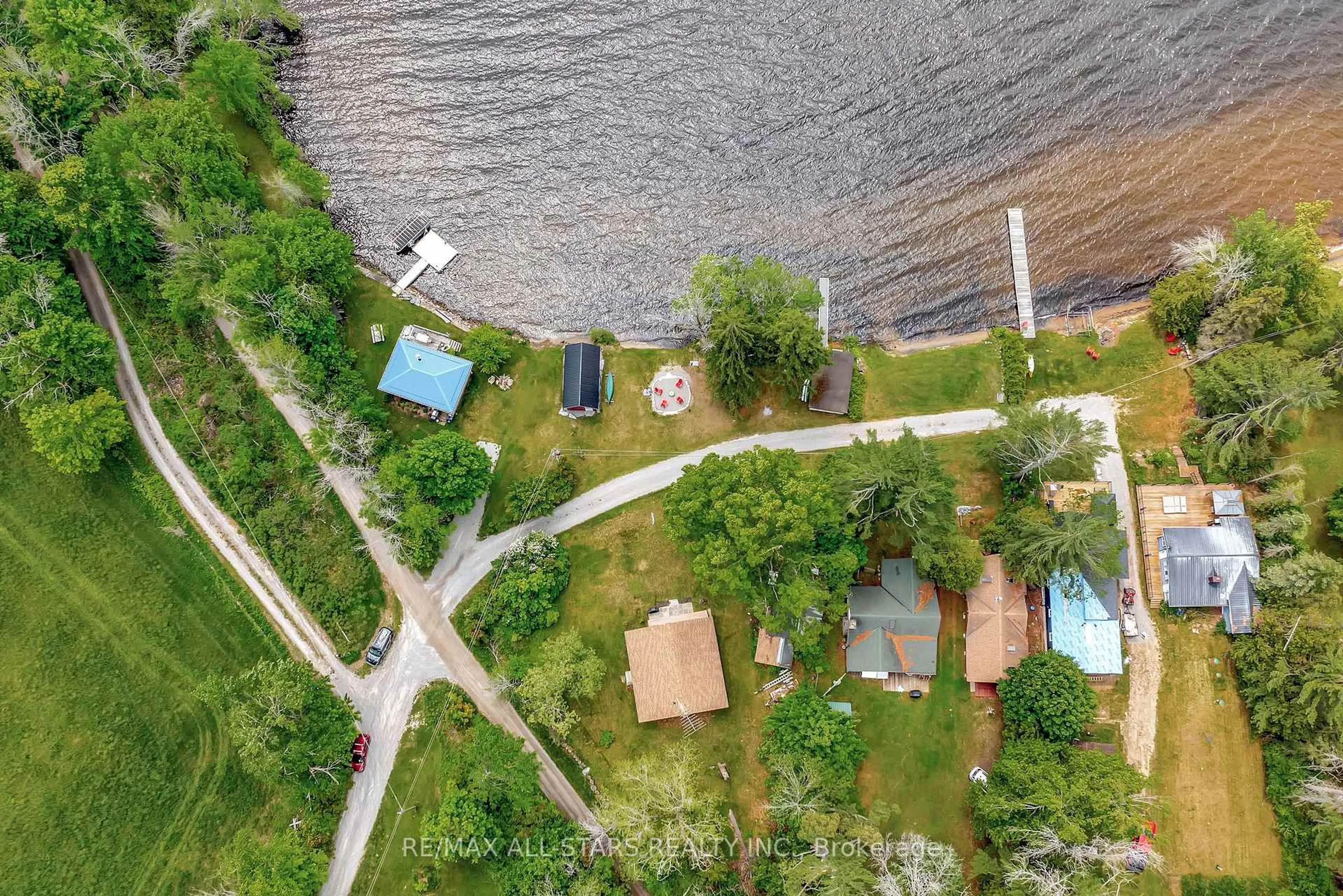 A pic from outside/outdoor area/front of a property/back of a property/a pic from drone, water/lake/river/ocean view for 36 Walnut St, Kawartha Lakes Ontario K0M 1N0