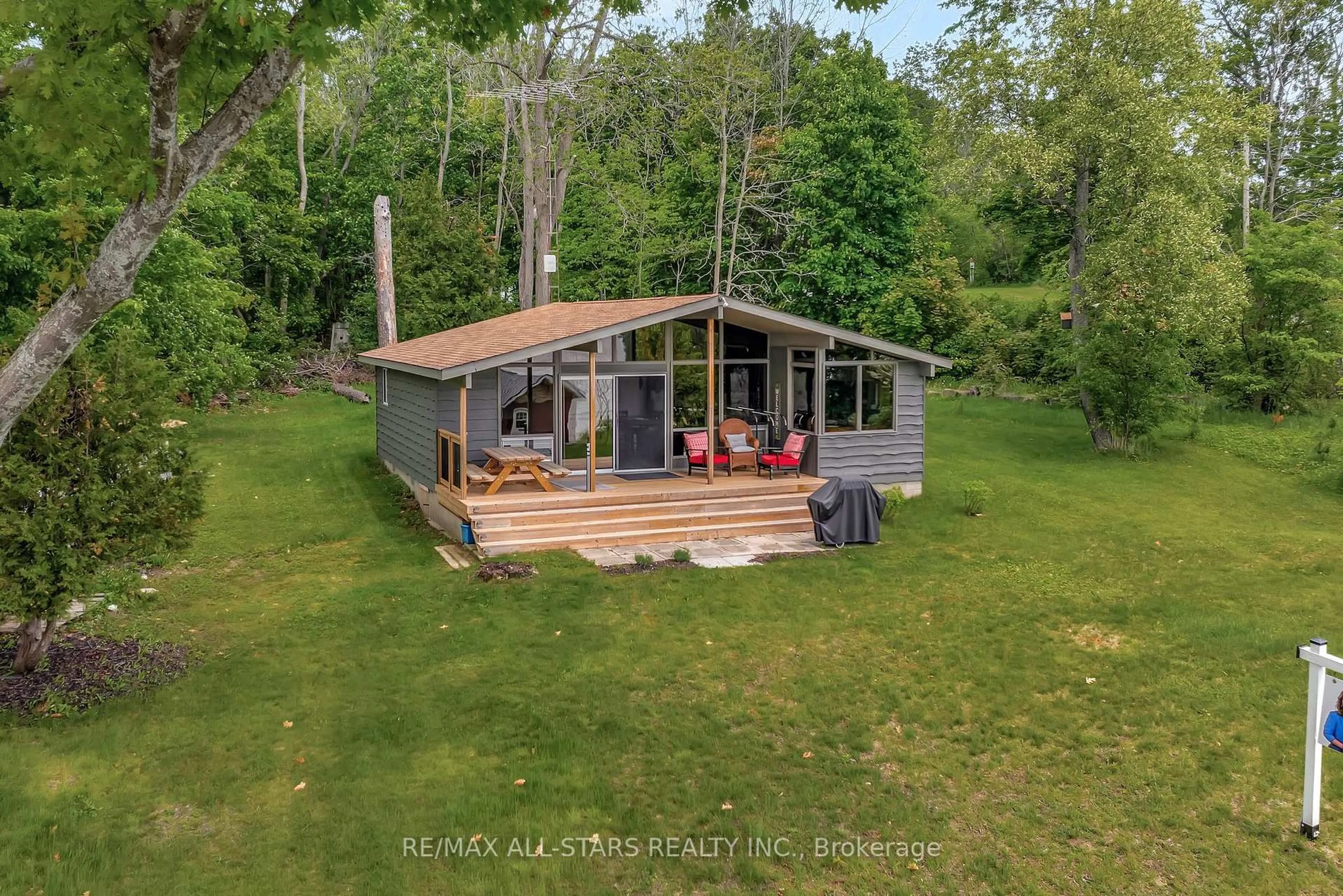 A pic from outside/outdoor area/front of a property/back of a property/a pic from drone, water/lake/river/ocean view for 36 Walnut St, Kawartha Lakes Ontario K0M 1N0
