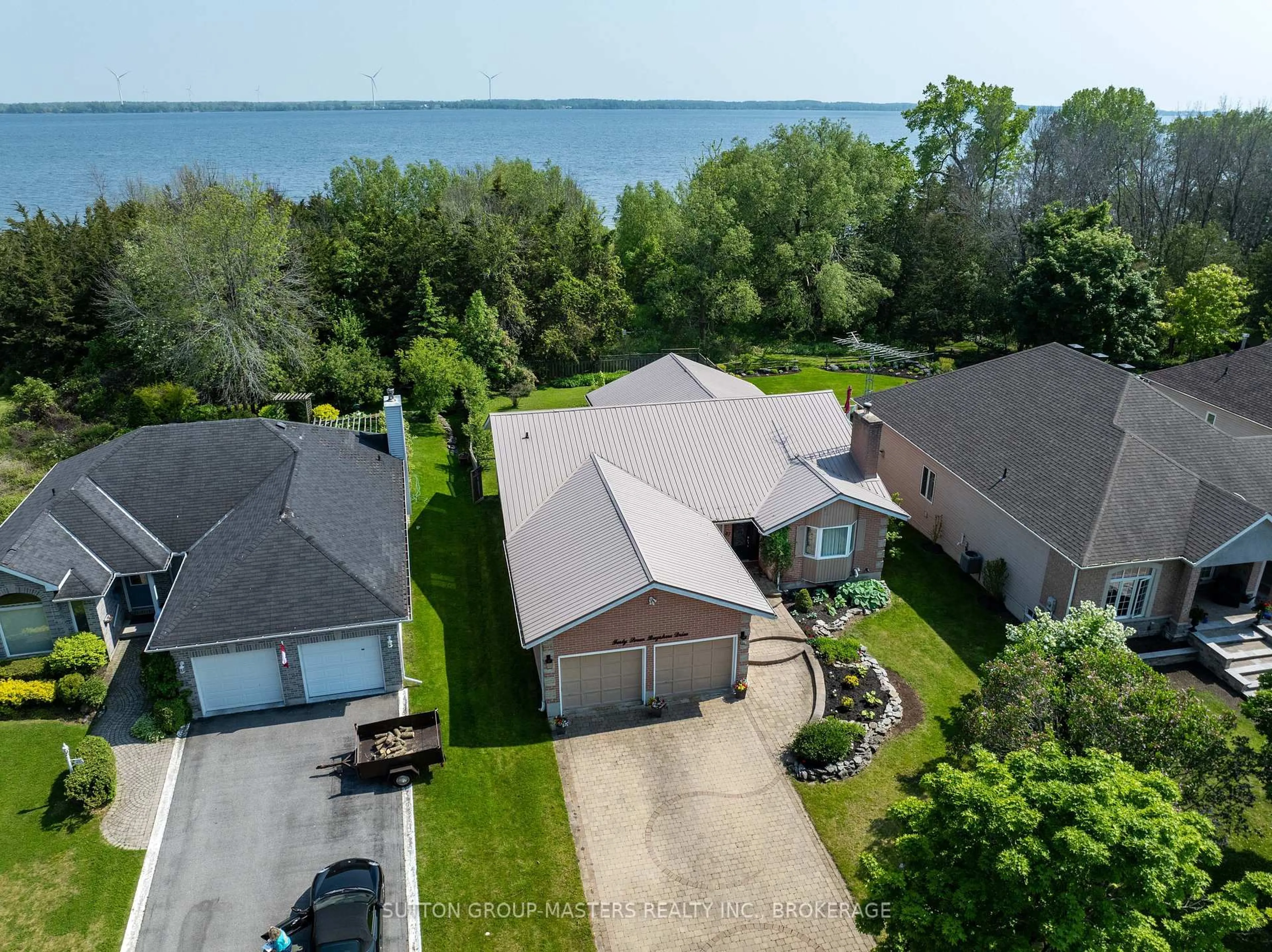 A pic from outside/outdoor area/front of a property/back of a property/a pic from drone, water/lake/river/ocean view for 47 Bayshore Dr, Bath Ontario K0H 1G0