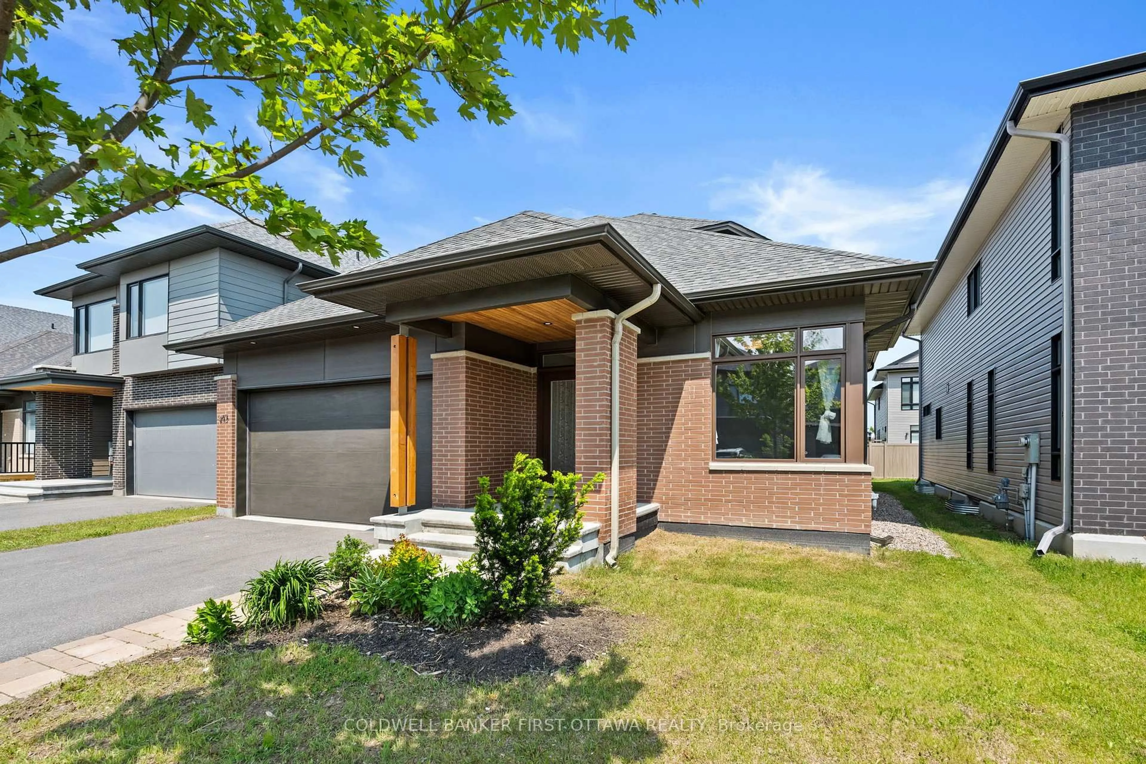 Home with brick exterior material, street for 945 ISLINGTON Way, Ottawa Ontario K1T 0T7