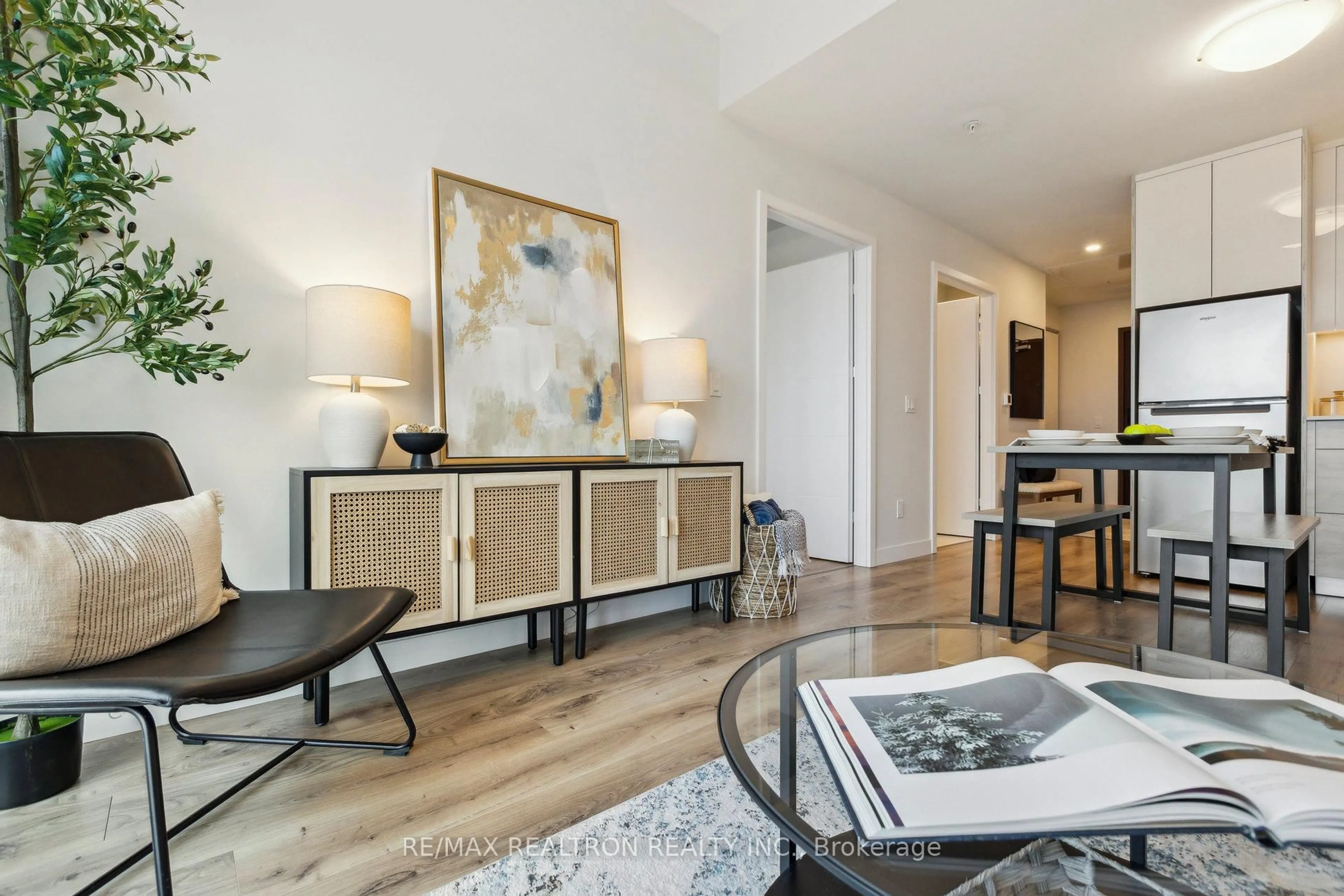 Living room with furniture, wood/laminate floor for 60 Frederick St #2903, Kitchener Ontario N2H 0C7