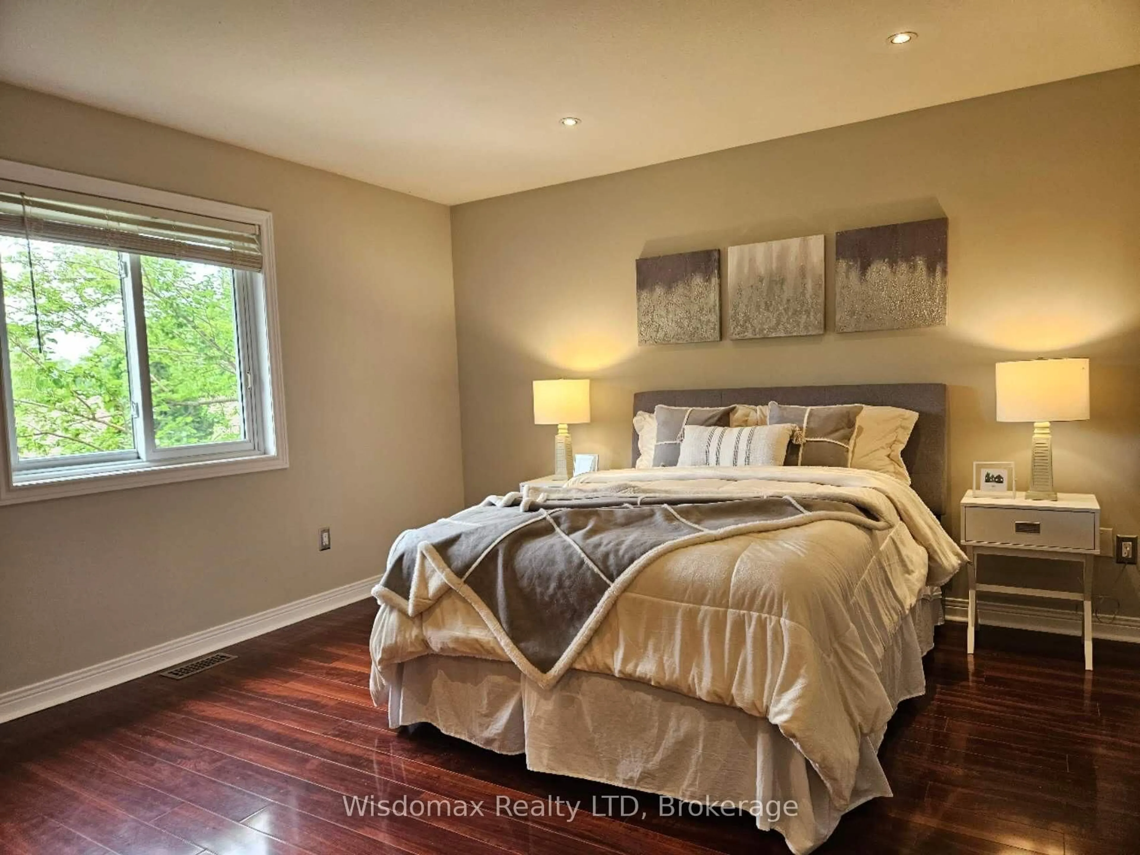 Bedroom with bed, wood/laminate floor for 8127 Orchard Grove Pkwy, Niagara Falls Ontario L2H 3E8