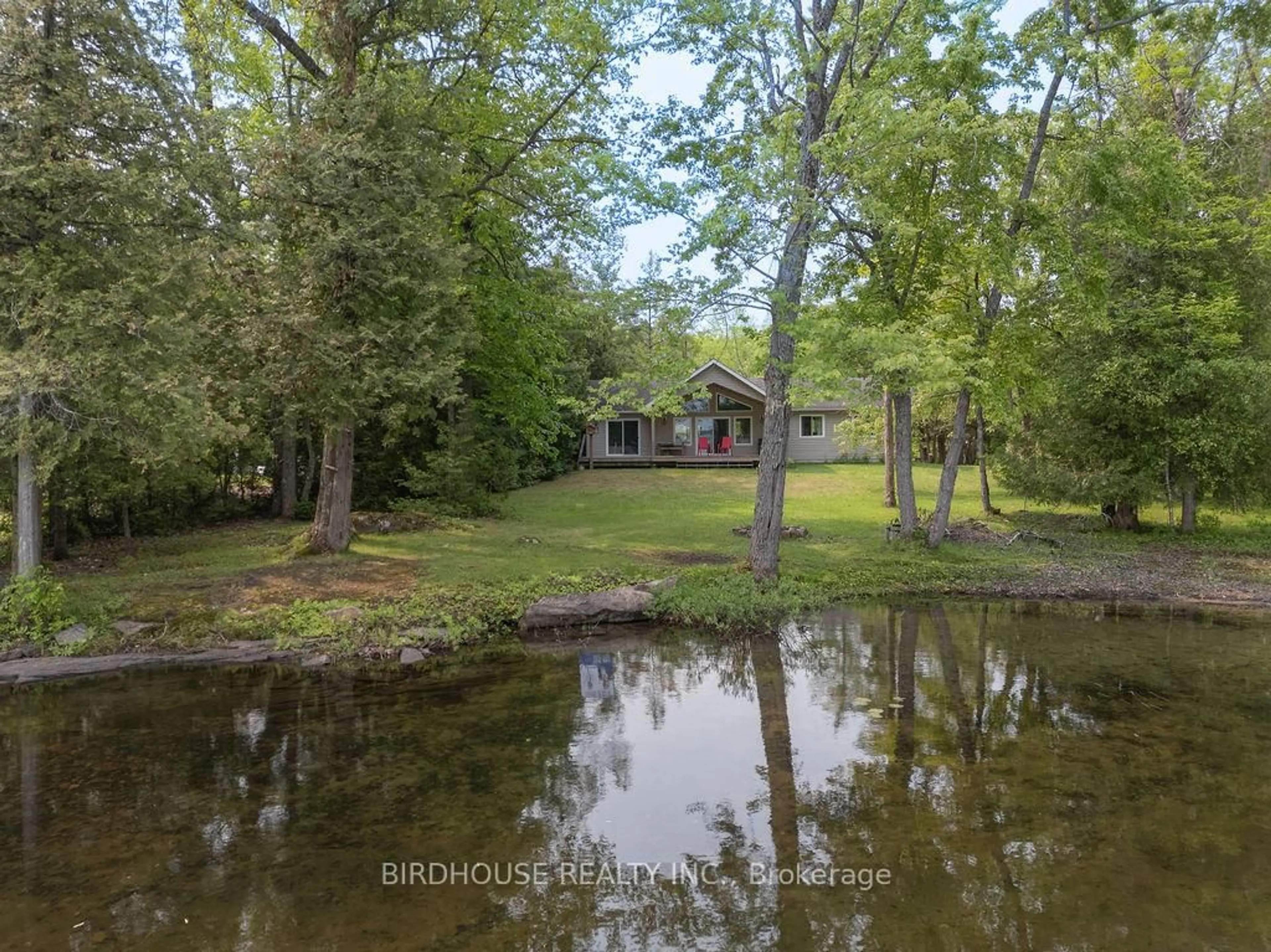 A pic from outside/outdoor area/front of a property/back of a property/a pic from drone, water/lake/river/ocean view for 17 Chester Lane, Kawartha Lakes Ontario K0M 2B0