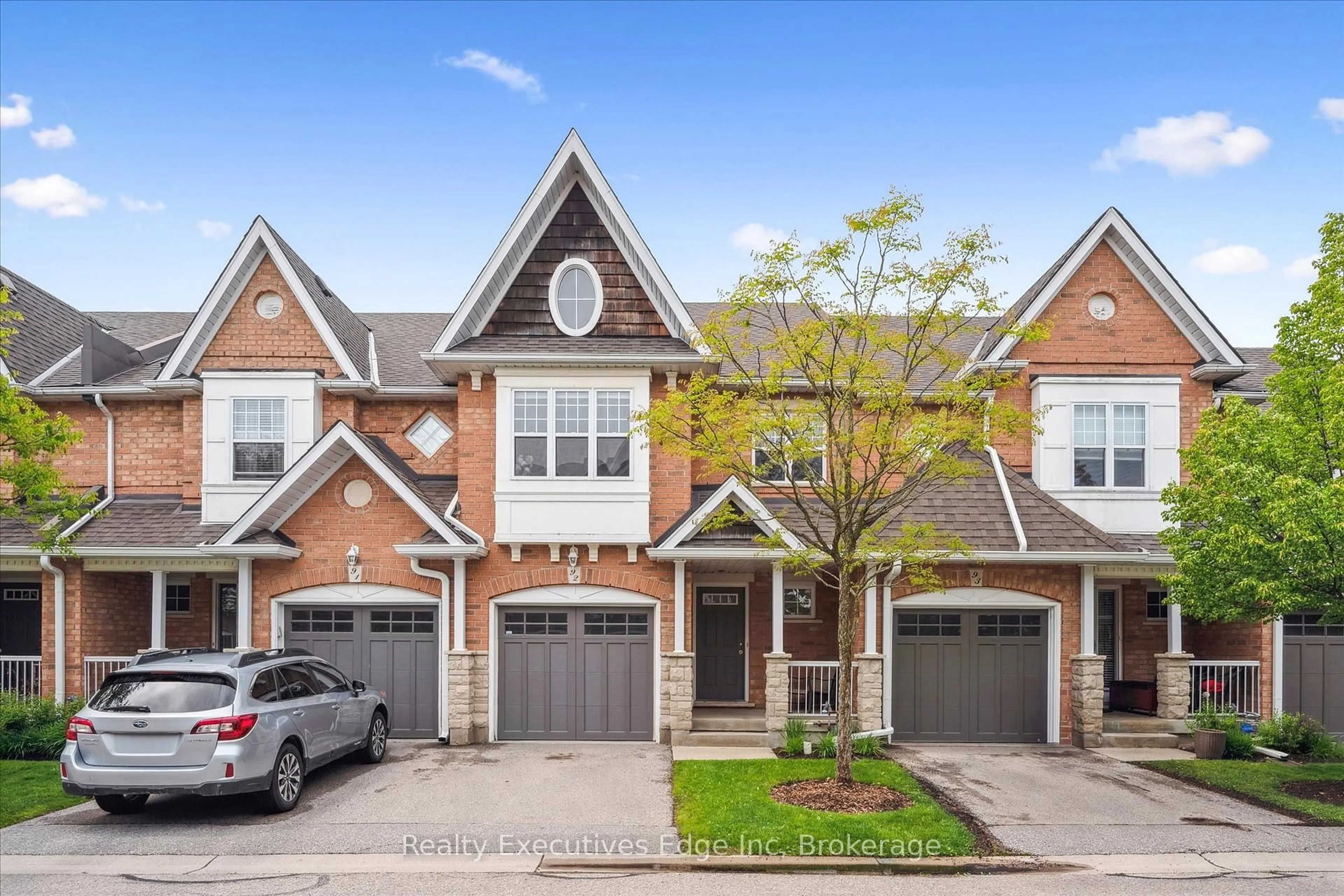 Home with brick exterior material, street for 165 Terraview Cres #92, Guelph Ontario N1G 5G9