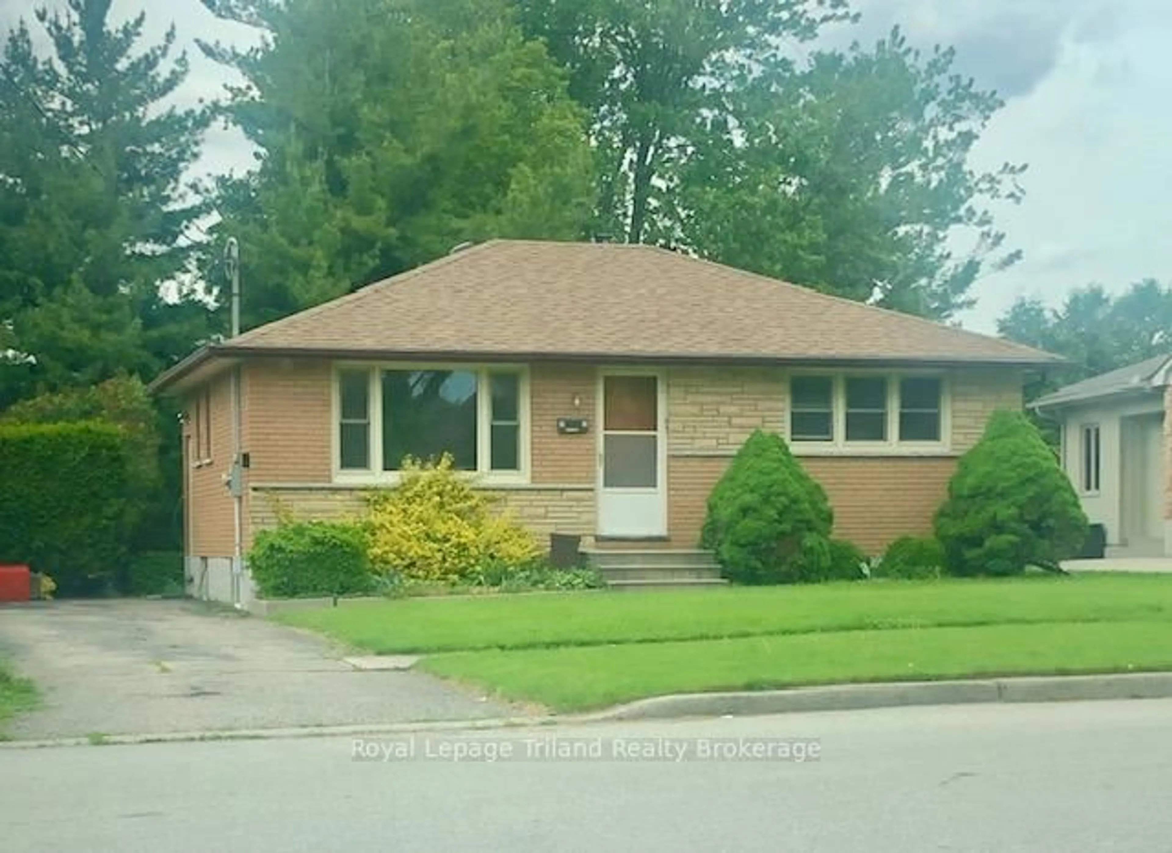 Home with brick exterior material, street for 1013 Sovereign Rd, Woodstock Ontario N4S 5P1