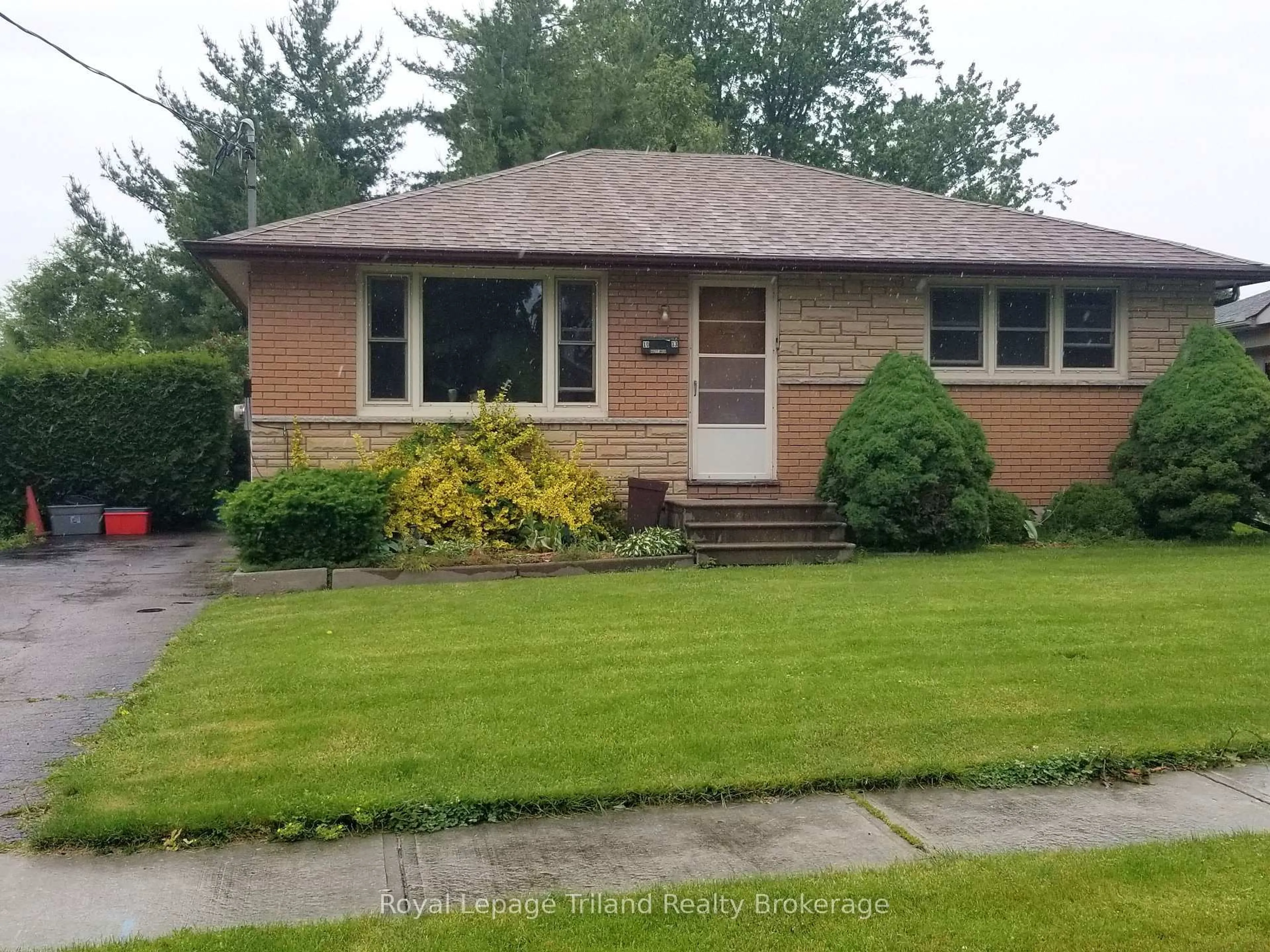 Home with vinyl exterior material, street for 1013 Sovereign Rd, Woodstock Ontario N4S 5P1