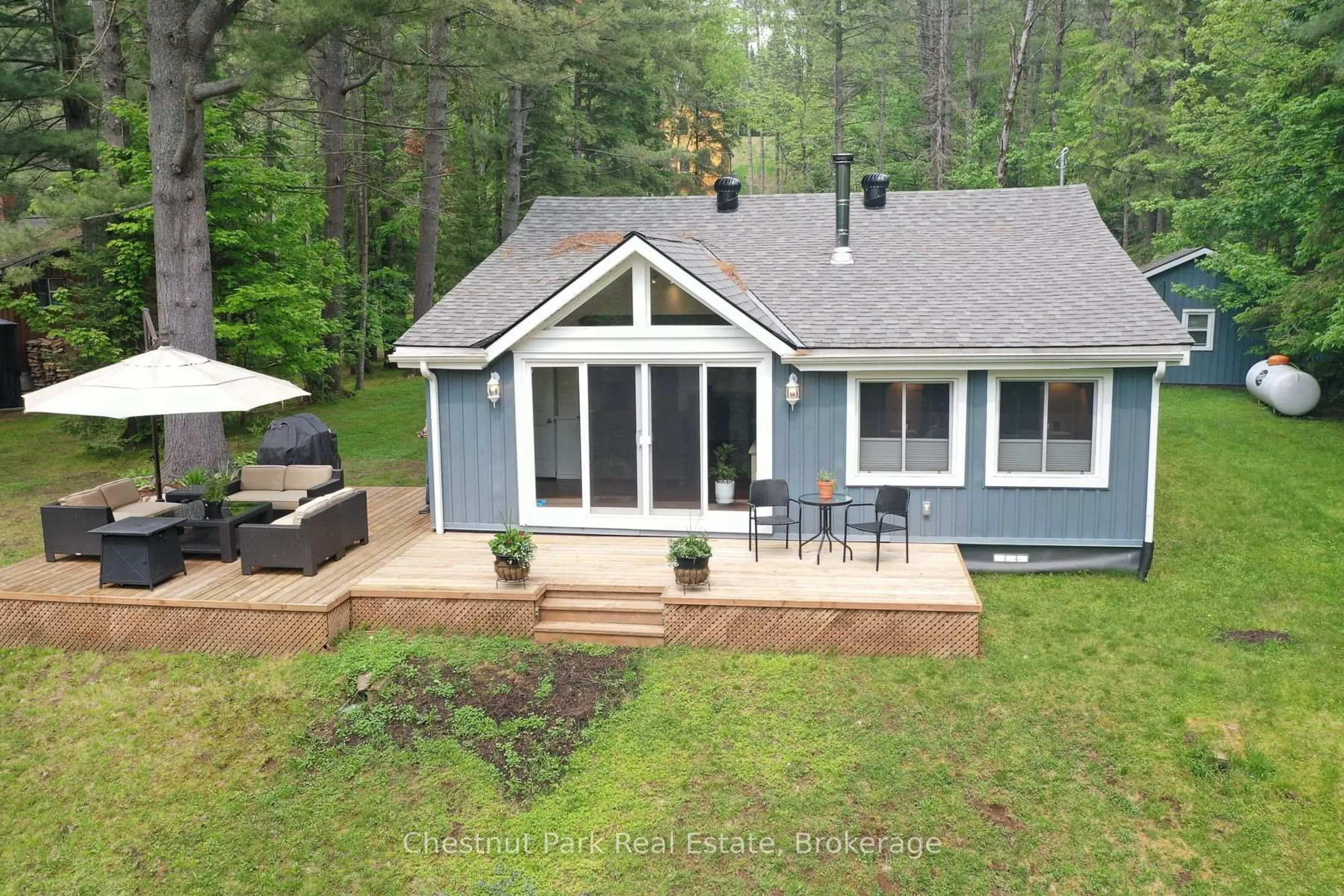 A pic from outside/outdoor area/front of a property/back of a property/a pic from drone, water/lake/river/ocean view for 76 Balsam Chutes Rd, Huntsville Ontario P0B 1L0