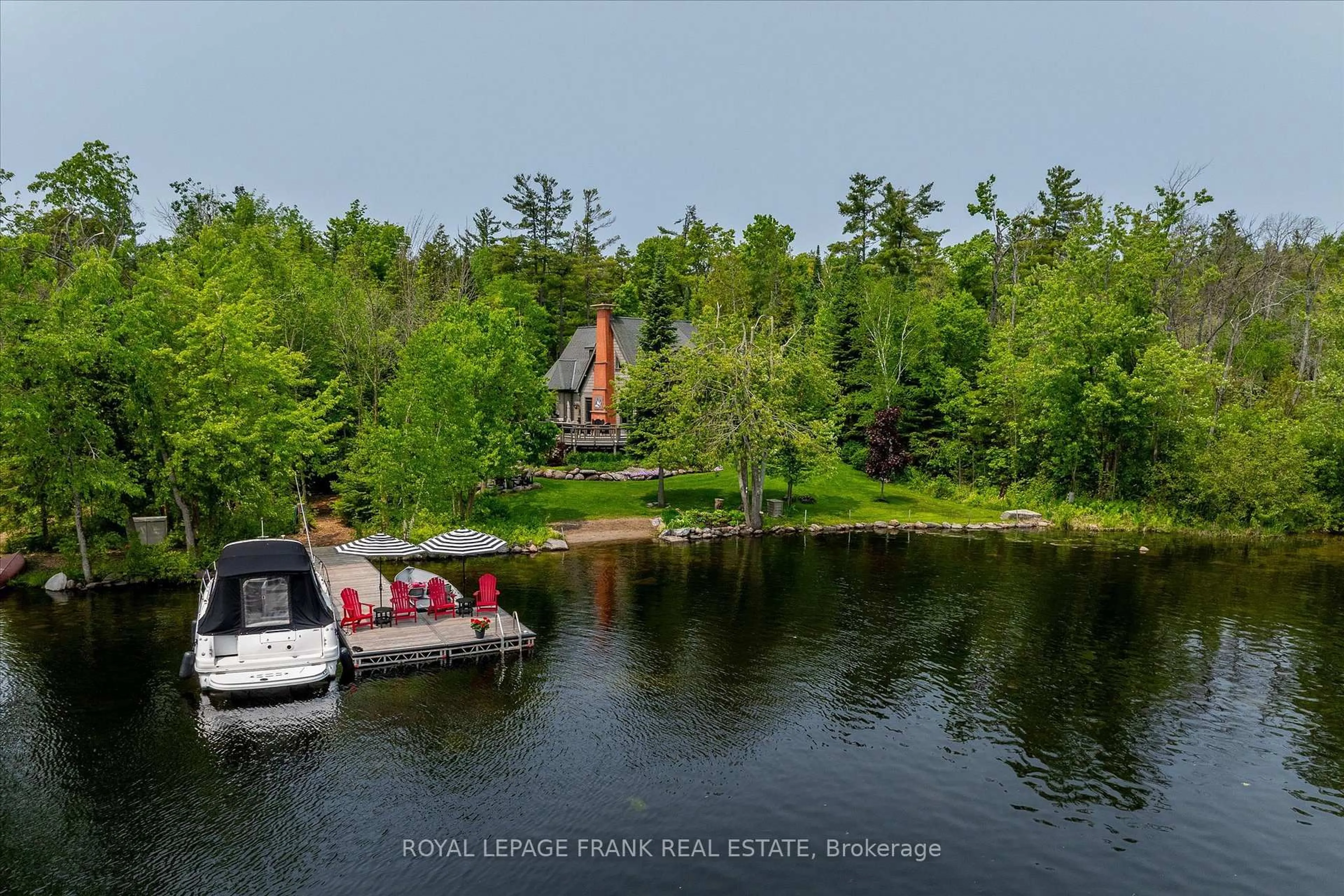A pic from outside/outdoor area/front of a property/back of a property/a pic from drone, water/lake/river/ocean view for 2187 Marshall Lane, Selwyn Ontario K0L 2H0