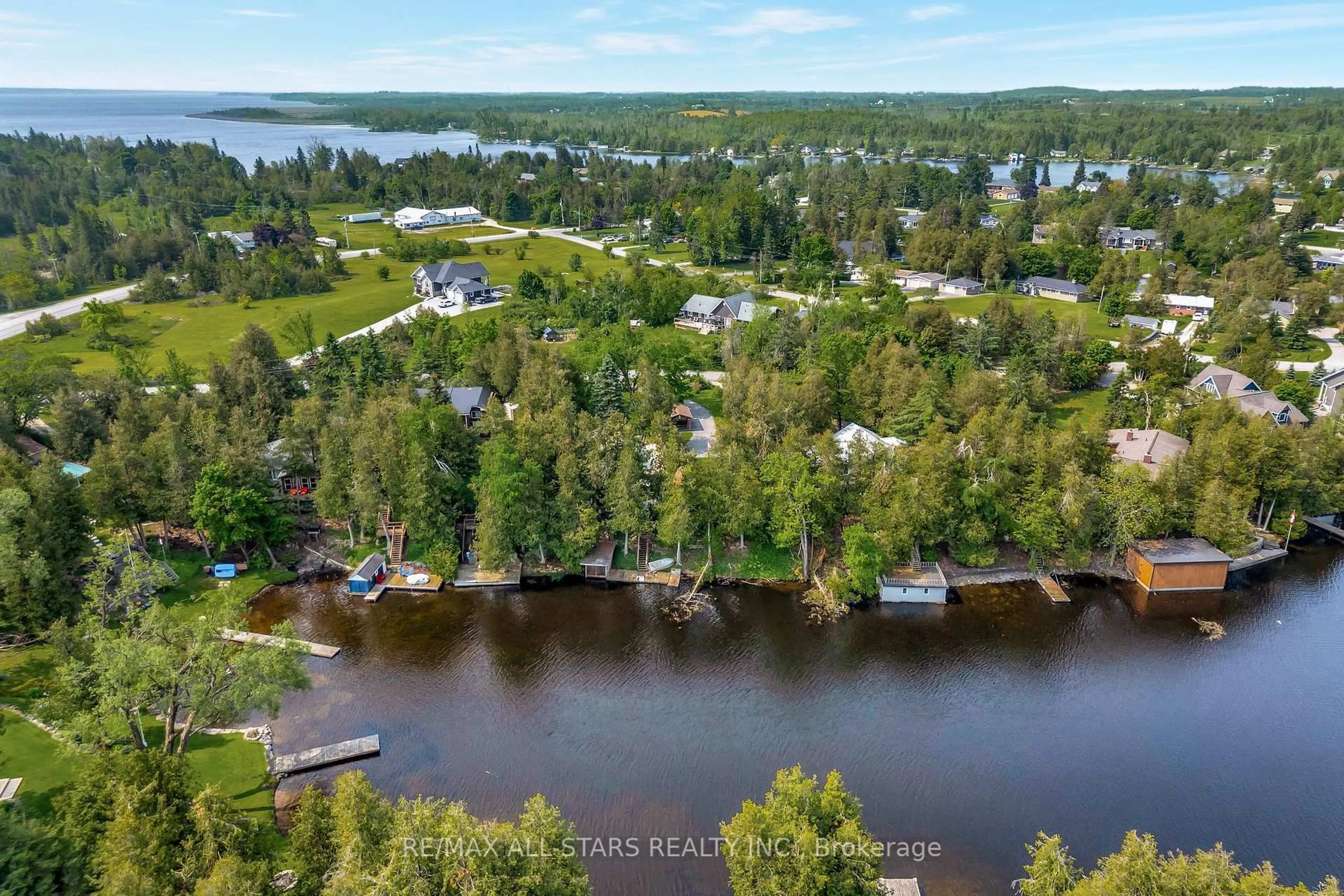 A pic from outside/outdoor area/front of a property/back of a property/a pic from drone, water/lake/river/ocean view for 14 Wychwood Dr, Kawartha Lakes Ontario K0M 1N0