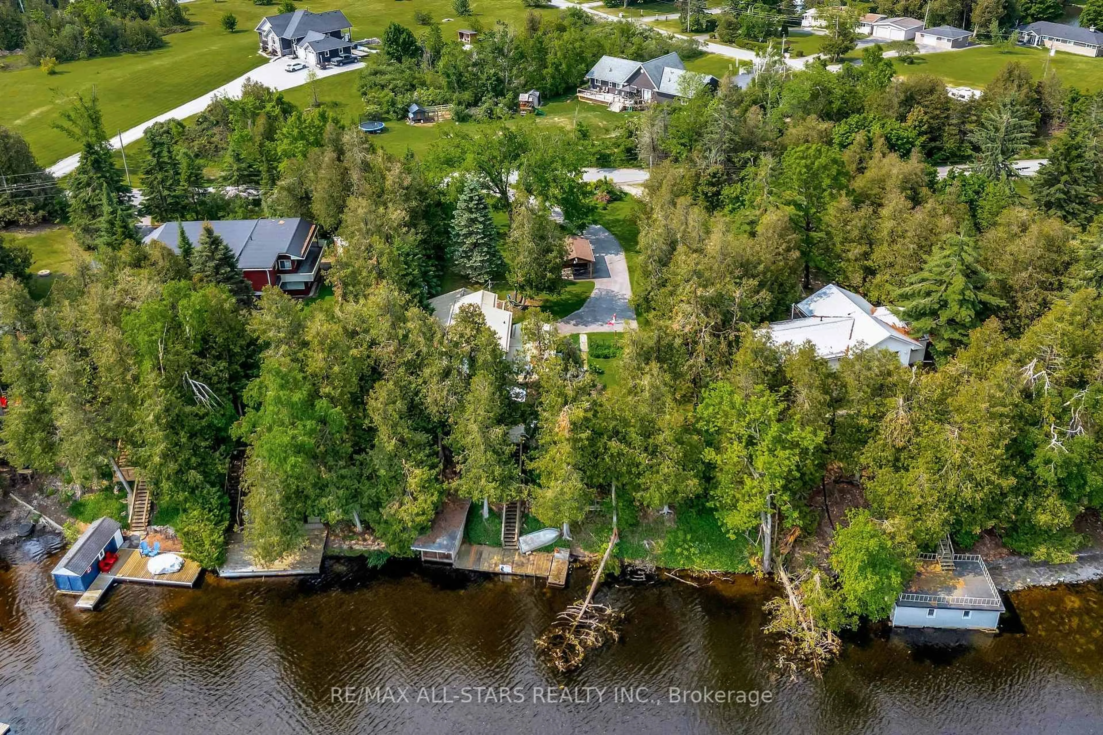 A pic from outside/outdoor area/front of a property/back of a property/a pic from drone, water/lake/river/ocean view for 14 Wychwood Dr, Kawartha Lakes Ontario K0M 1N0