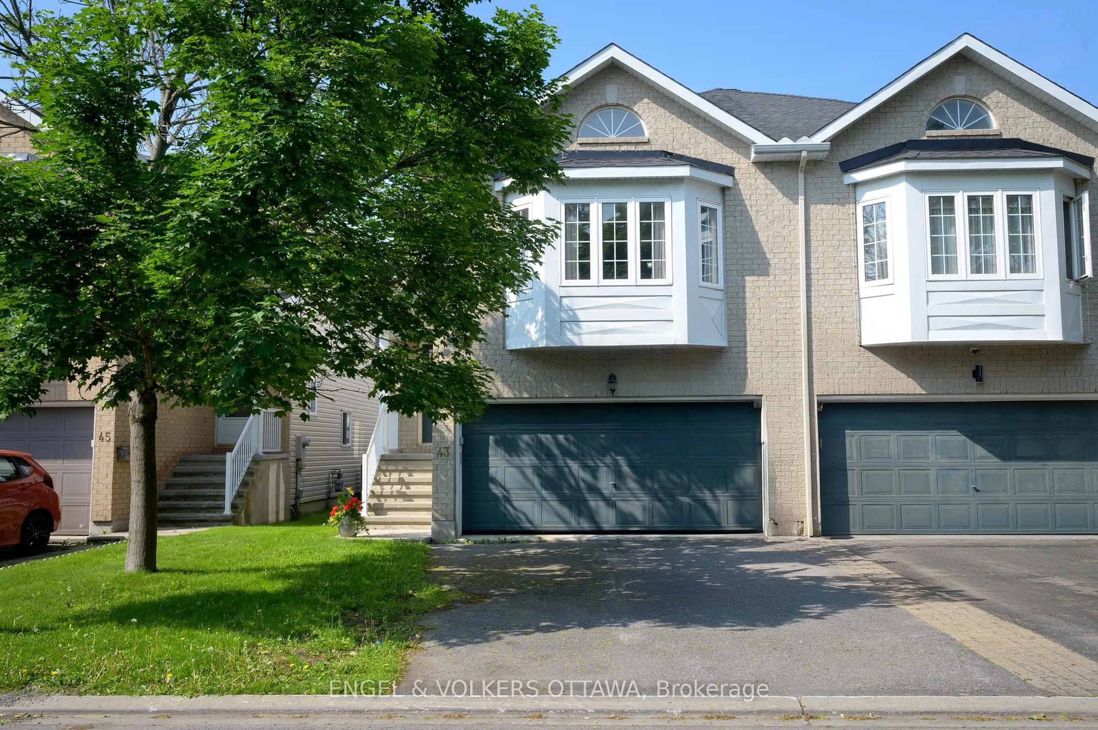 Home with vinyl exterior material, street for 43 Castle Glen Cres, Ottawa Ontario K2L 4G9