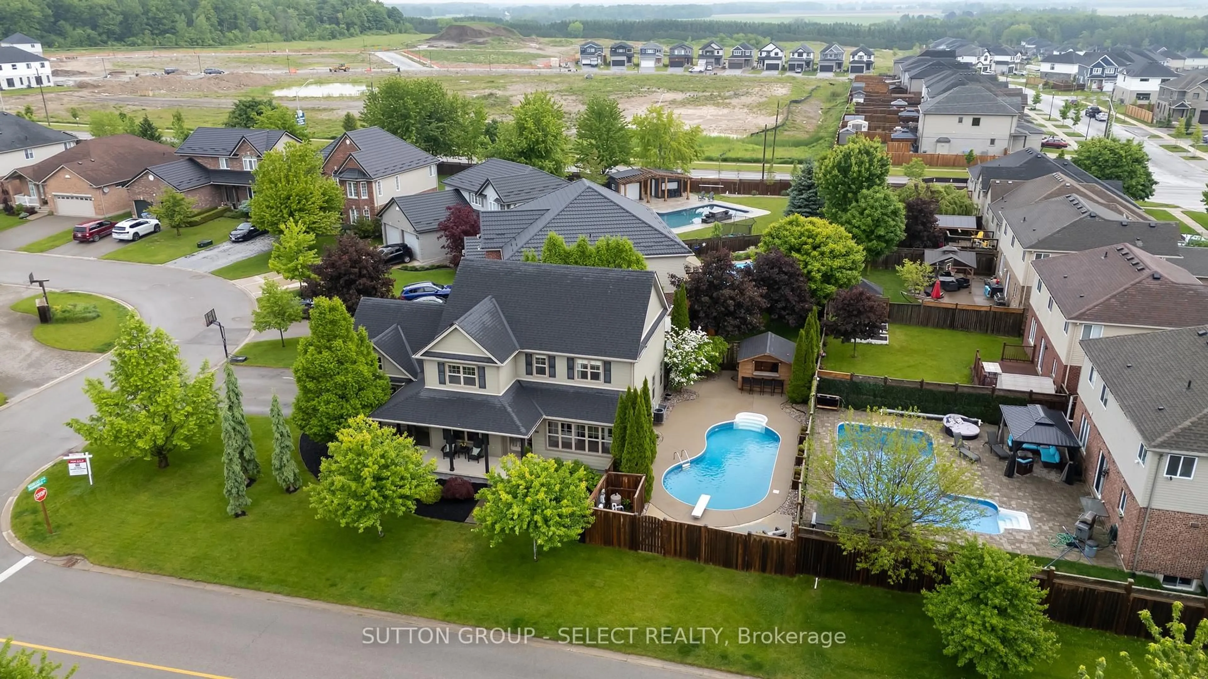 A pic from outside/outdoor area/front of a property/back of a property/a pic from drone, water/lake/river/ocean view for 106 Woodlily Lane, Middlesex Centre Ontario N0M 2A0
