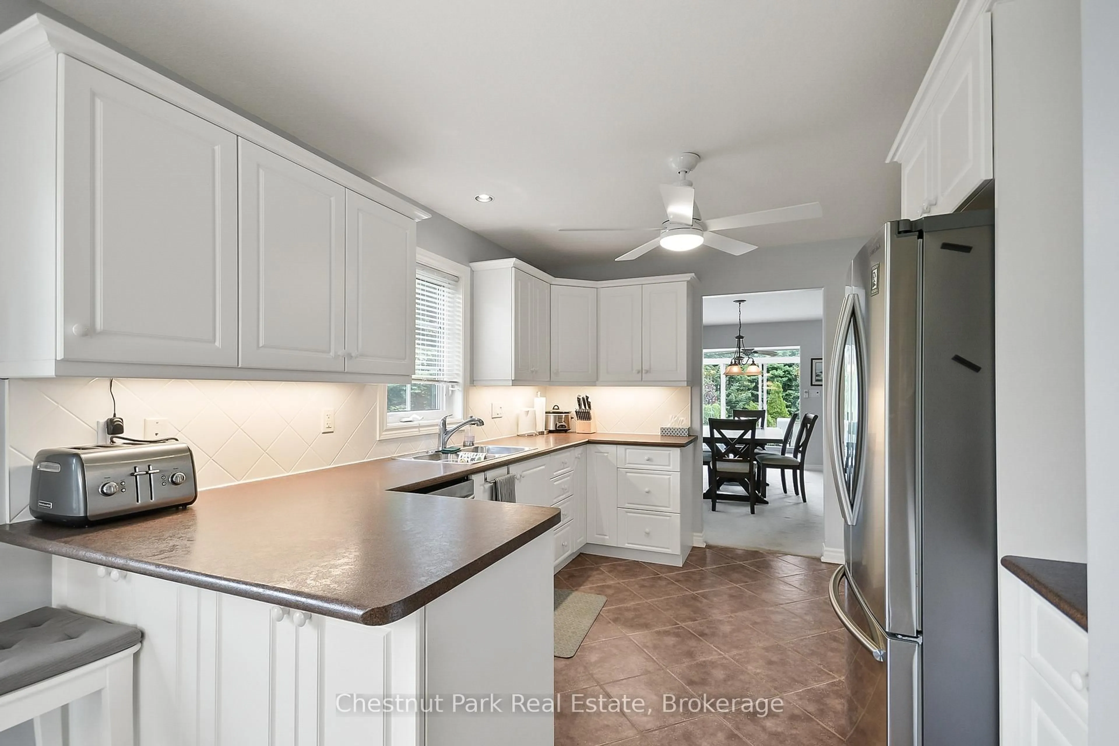 Open concept kitchen, ceramic/tile floor for 69 Ewing St, Bracebridge Ontario P1L 2H7