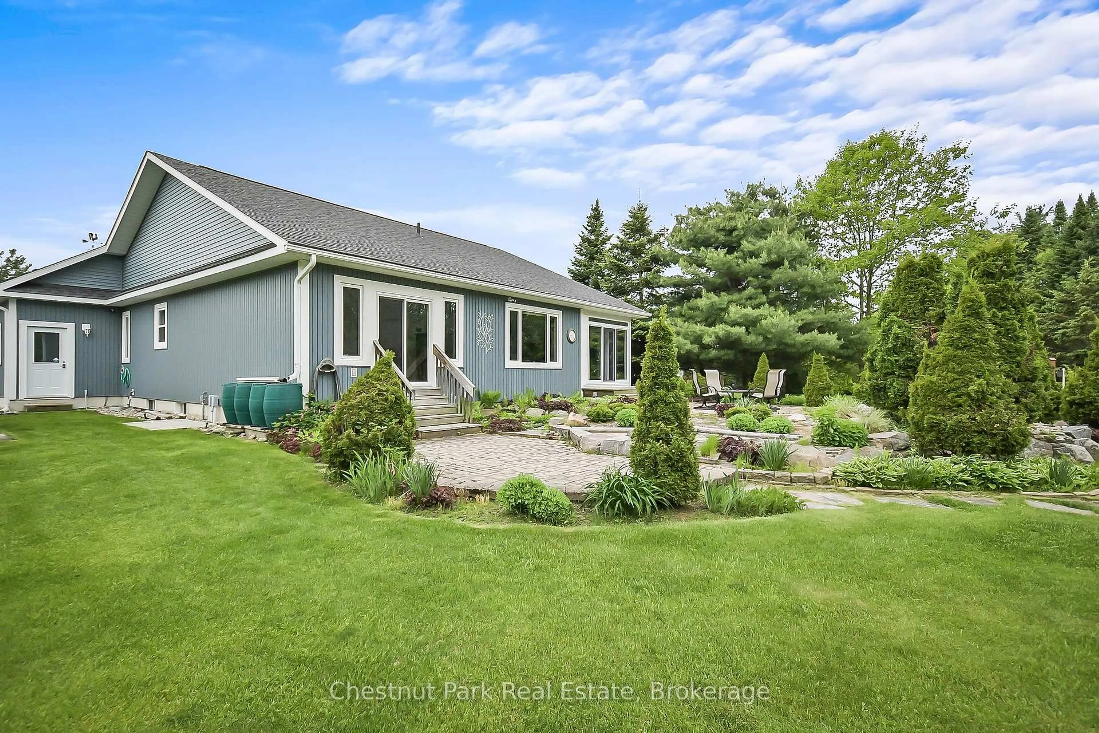 A pic from outside/outdoor area/front of a property/back of a property/a pic from drone, water/lake/river/ocean view for 69 Ewing St, Bracebridge Ontario P1L 2H7