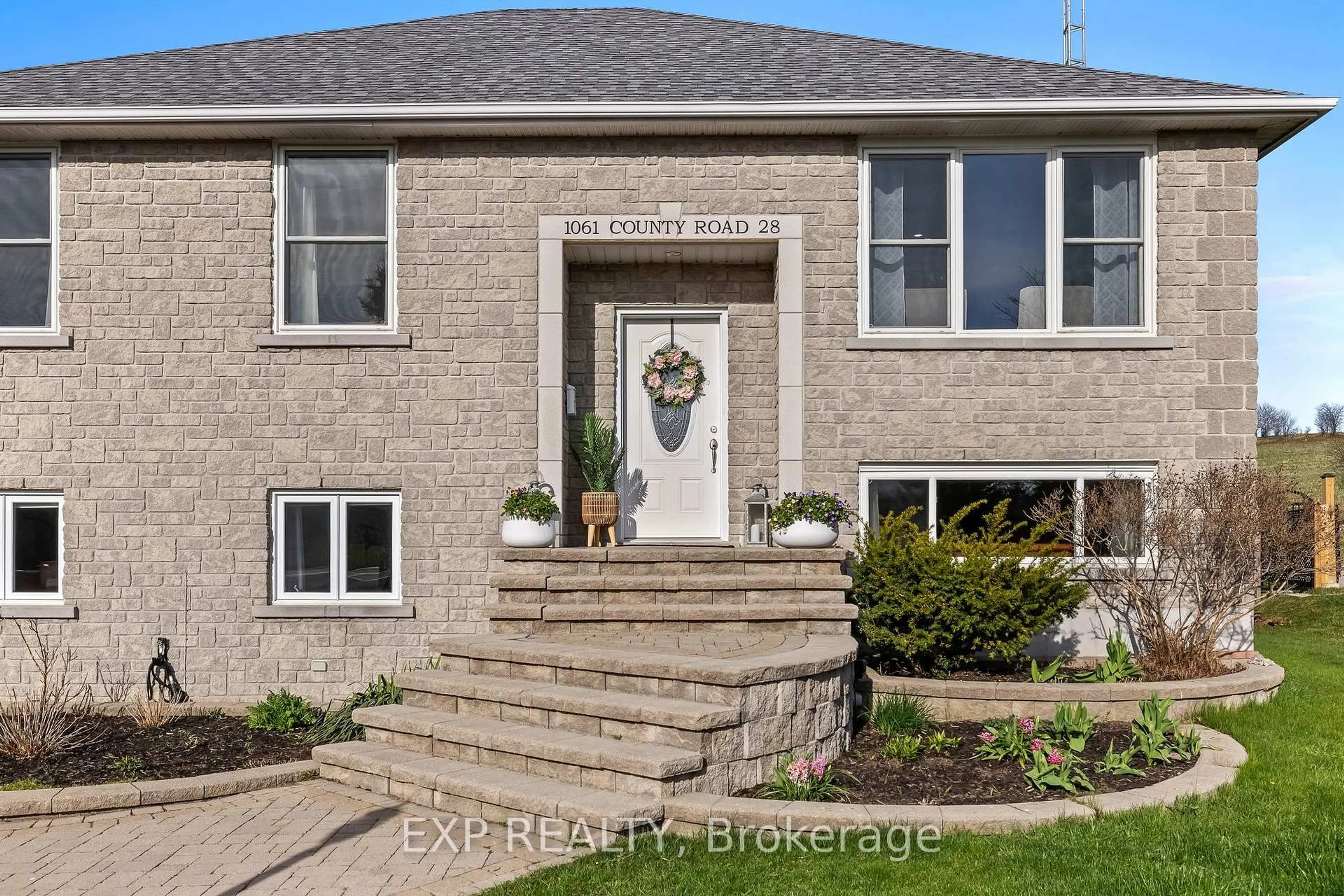Home with brick exterior material, street for 1061 County 28 Rd, Otonabee-South Monaghan Ontario K0L 1V0