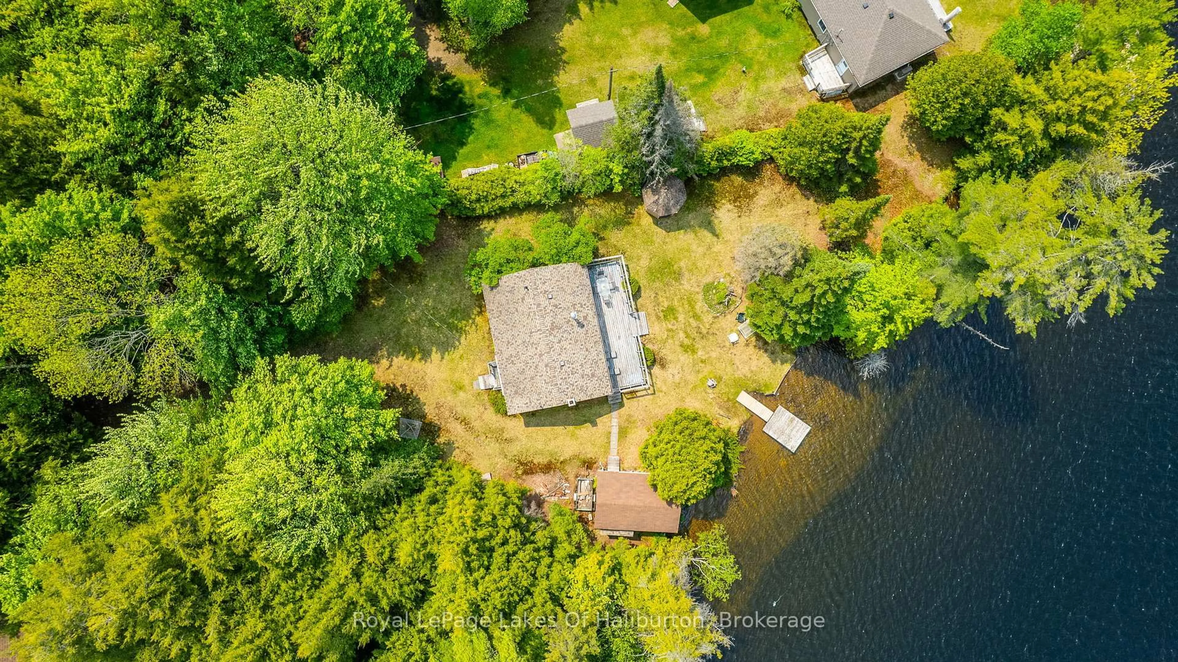 A pic from outside/outdoor area/front of a property/back of a property/a pic from drone, water/lake/river/ocean view for 1058 DOREEN'S Lane, Highlands East Ontario K0L 2Y0