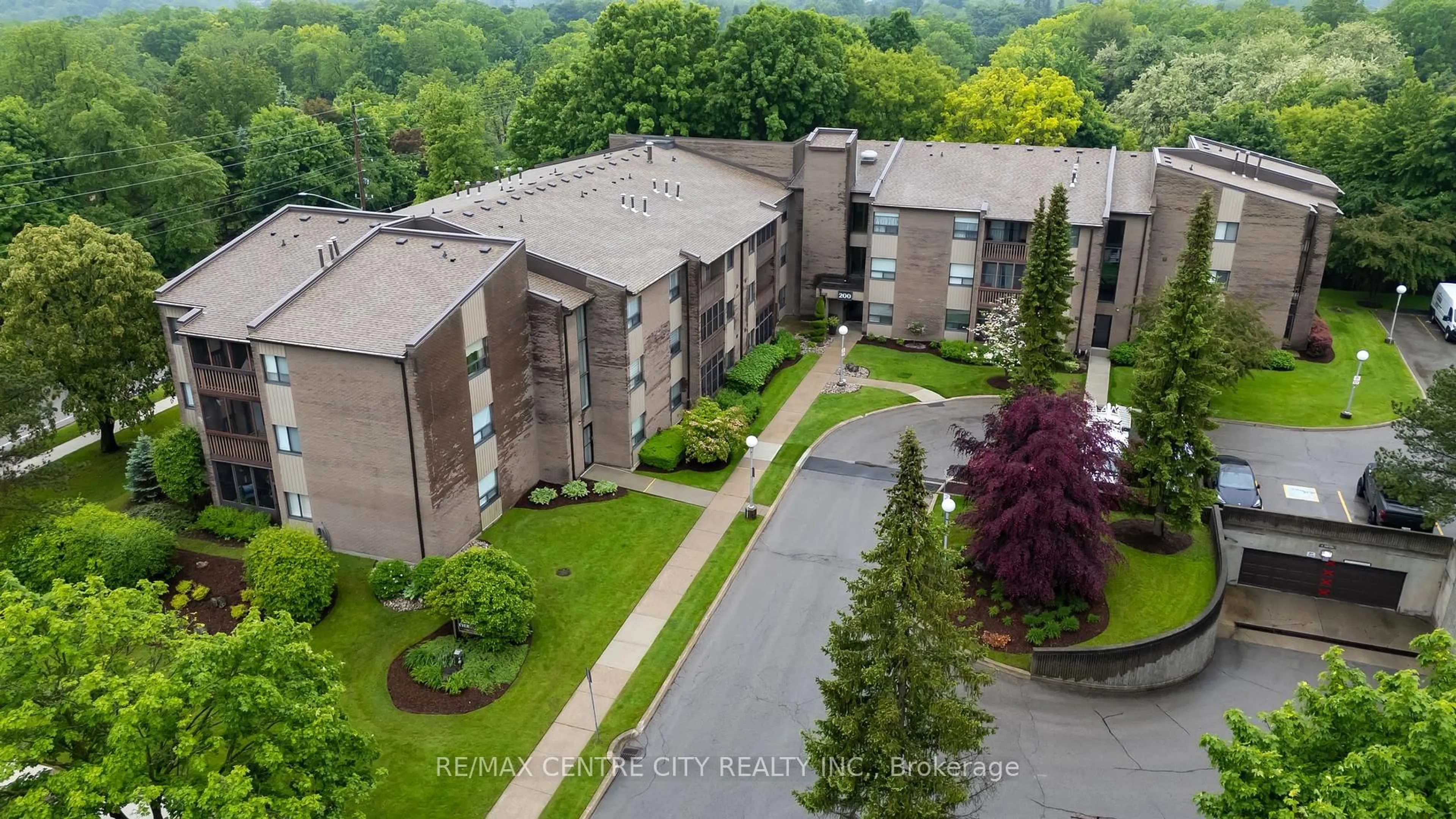 A pic from outside/outdoor area/front of a property/back of a property/a pic from drone, unknown for 300 Everglade Cres #206, London North Ontario N6H 4P8