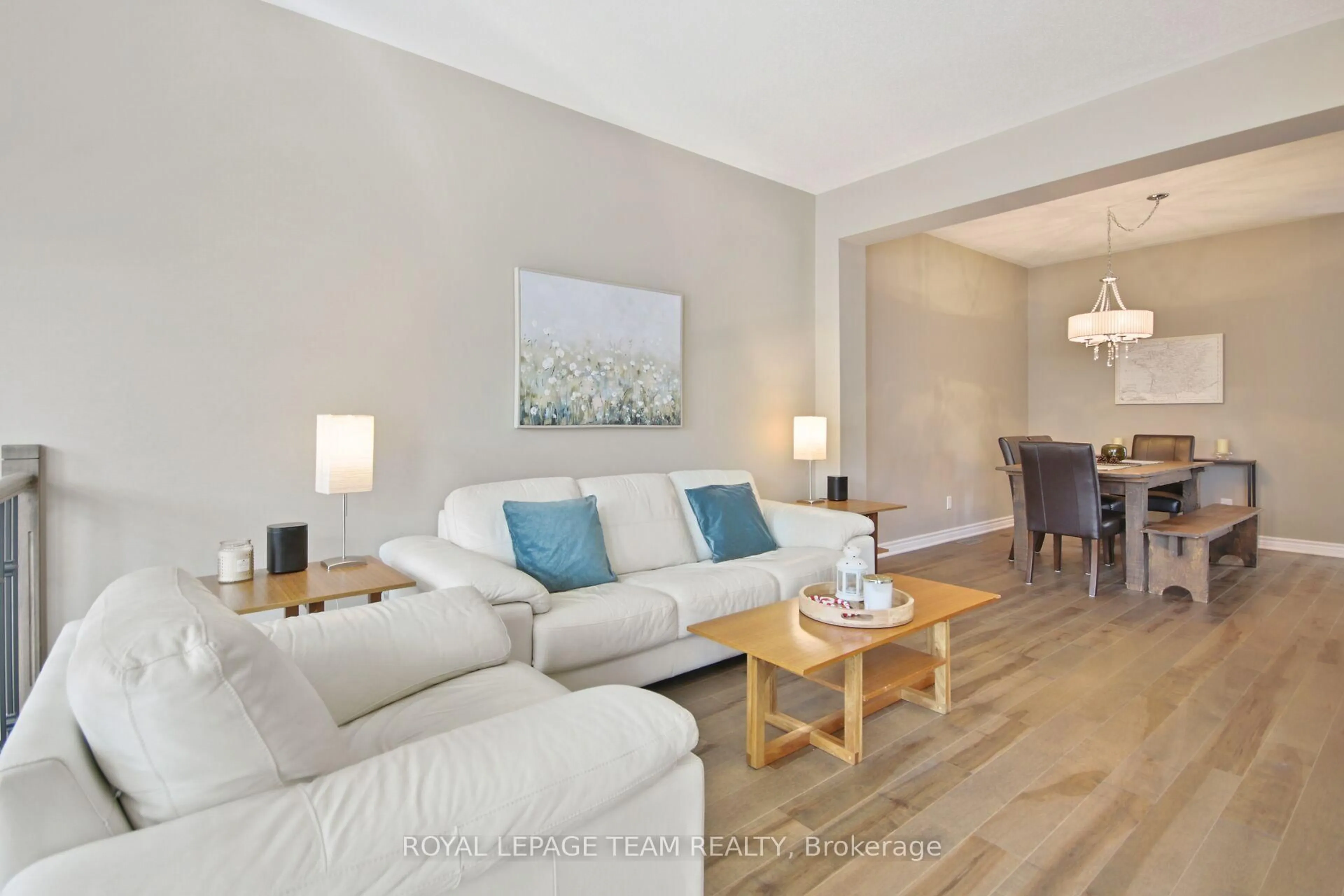 Living room with furniture, wood/laminate floor for 254 Celtic Ridge Cres, Ottawa Ontario K2W 0C3
