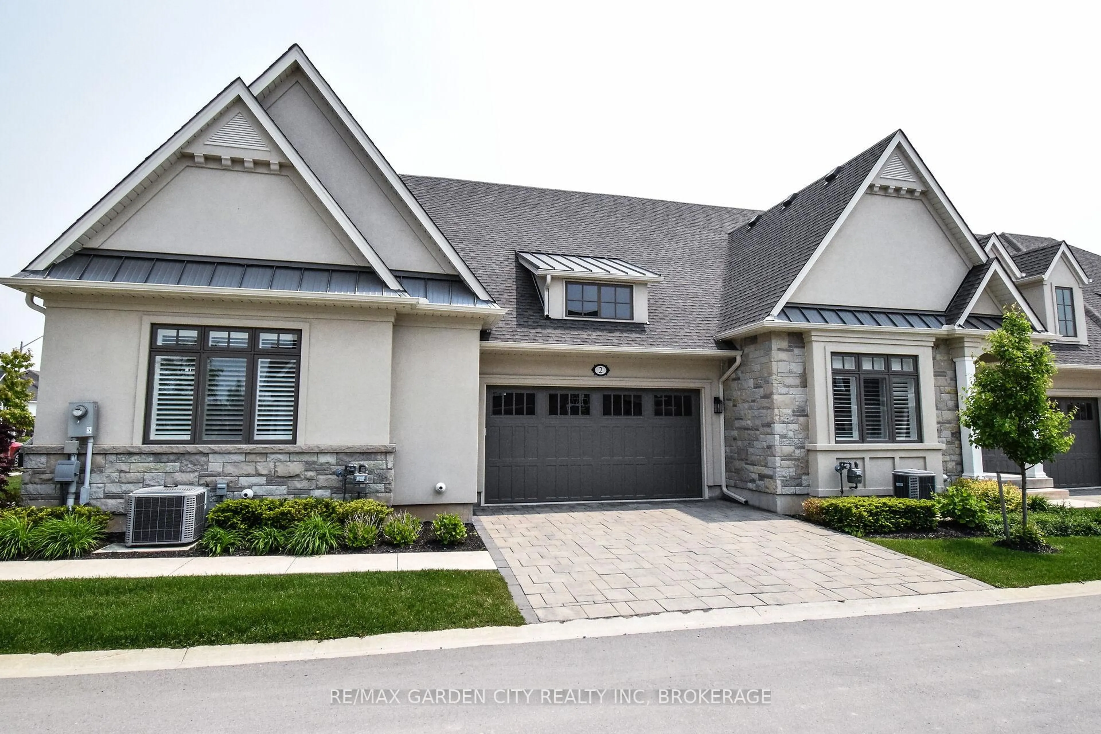 Home with brick exterior material, street for 2 SASSAFRAS Row, Fort Erie Ontario L0S 1N0