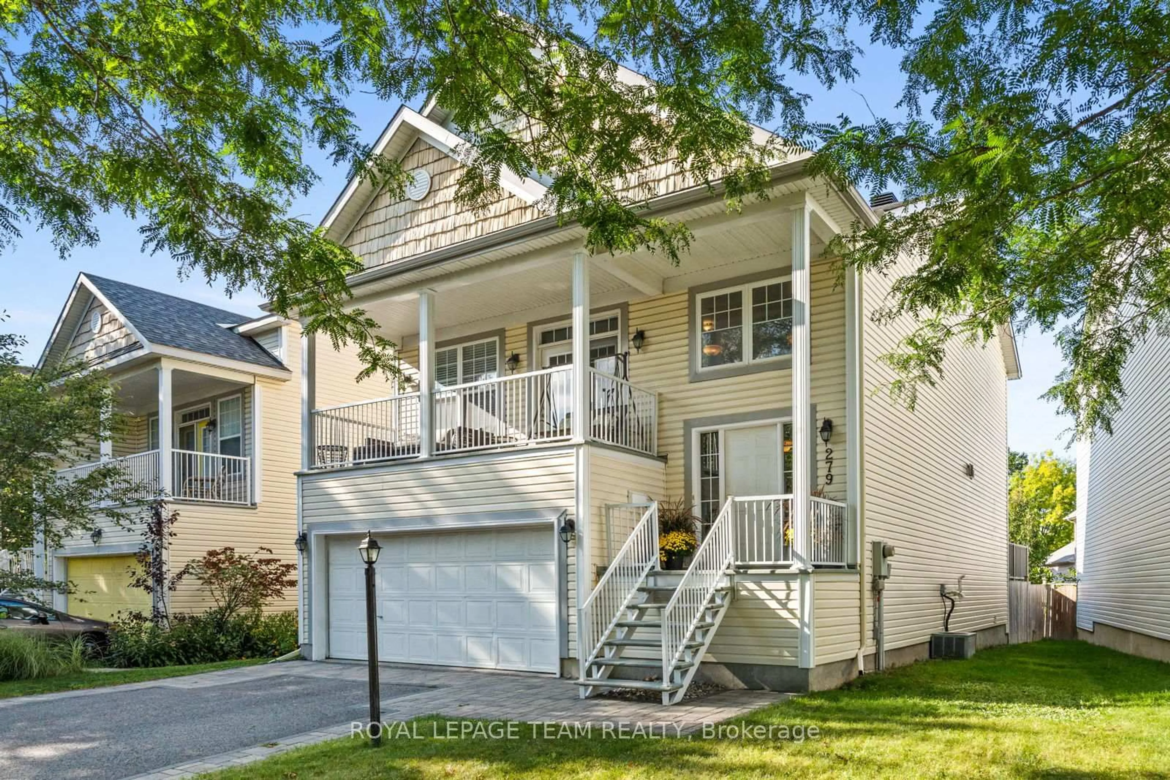 Home with vinyl exterior material, street for 279 Berrigan Dr, Ottawa Ontario K2J 5C3