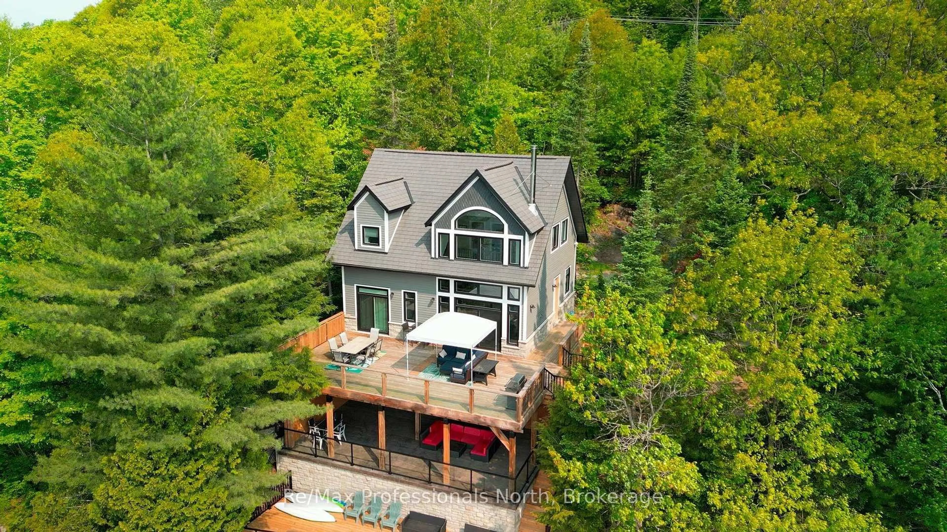 A pic from outside/outdoor area/front of a property/back of a property/a pic from drone, unknown for 1024 Albert Lane, Algonquin Highlands Ontario P0E 1E0