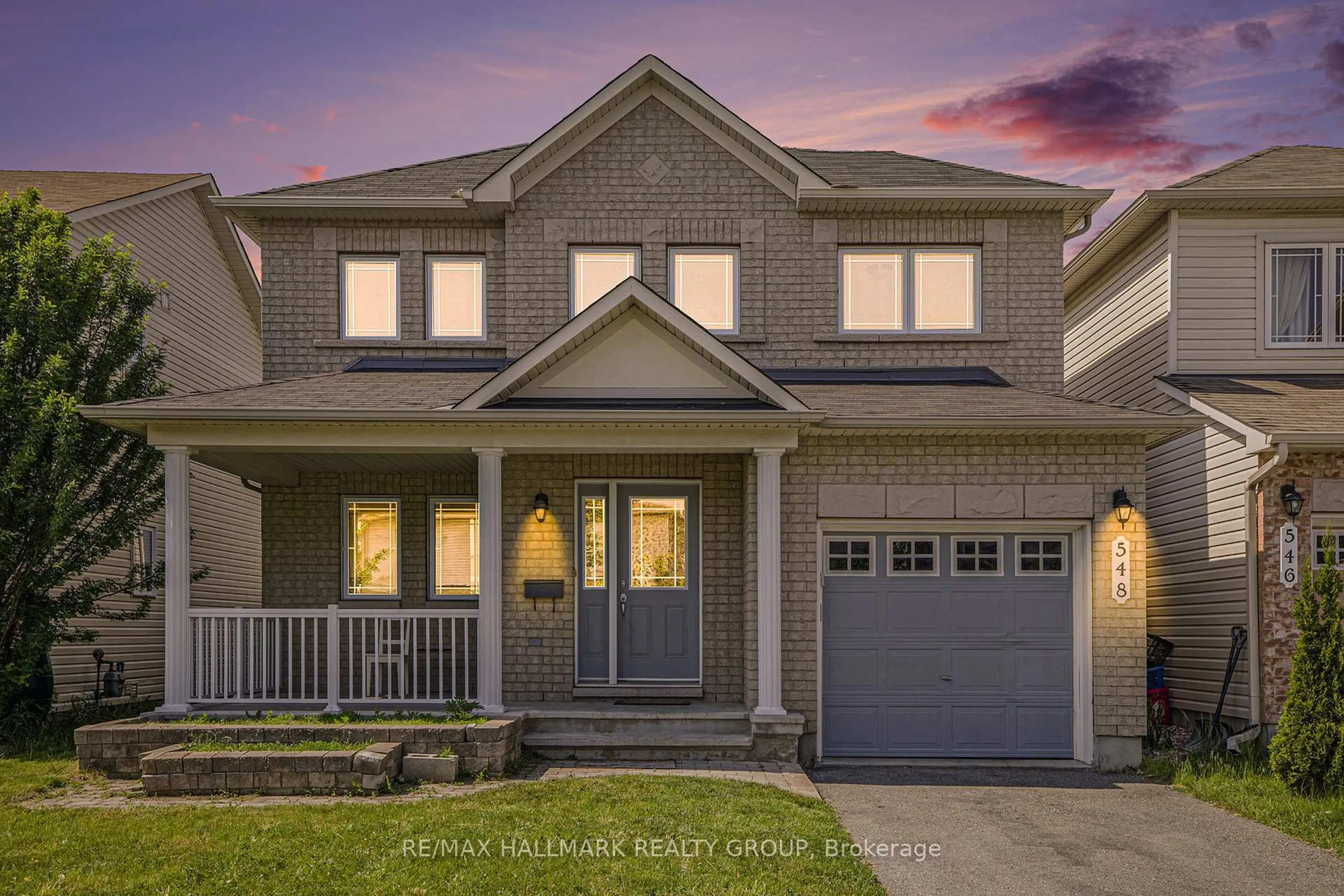 Home with vinyl exterior material, street for 548 PAUL METIVIER Dr, Ottawa Ontario K2J 0M9