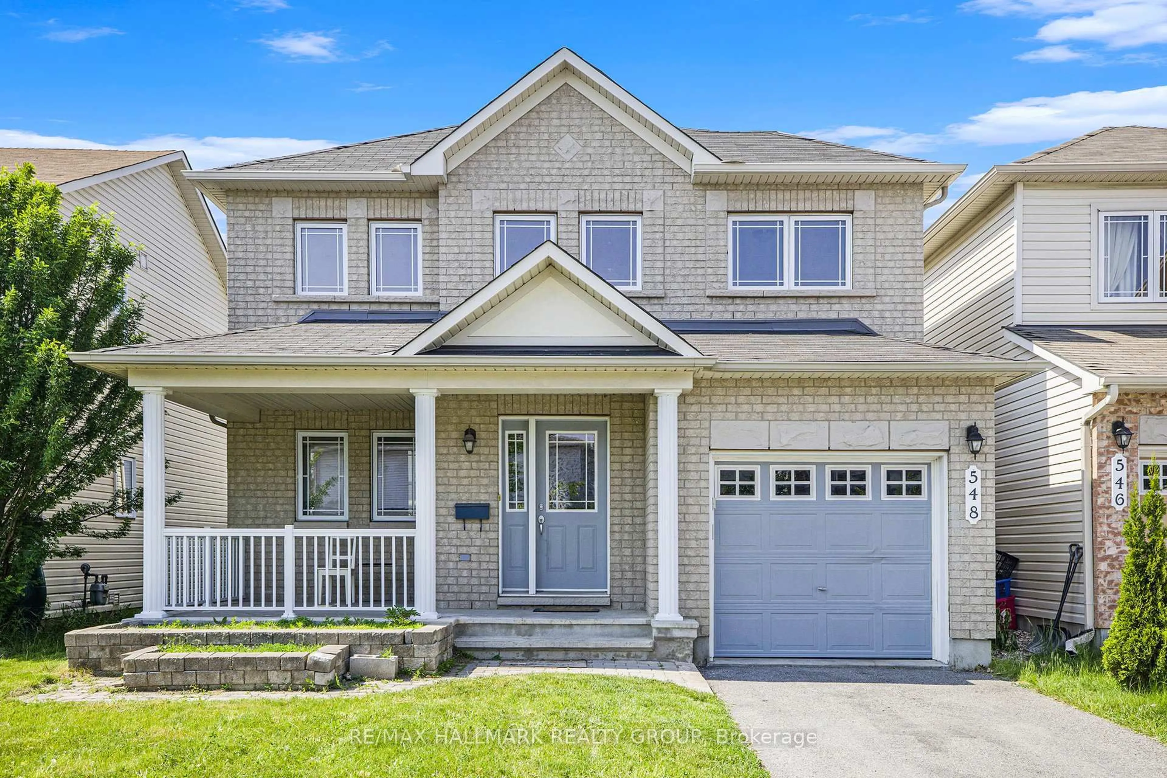 Home with vinyl exterior material, street for 548 PAUL METIVIER Dr, Ottawa Ontario K2J 0M9