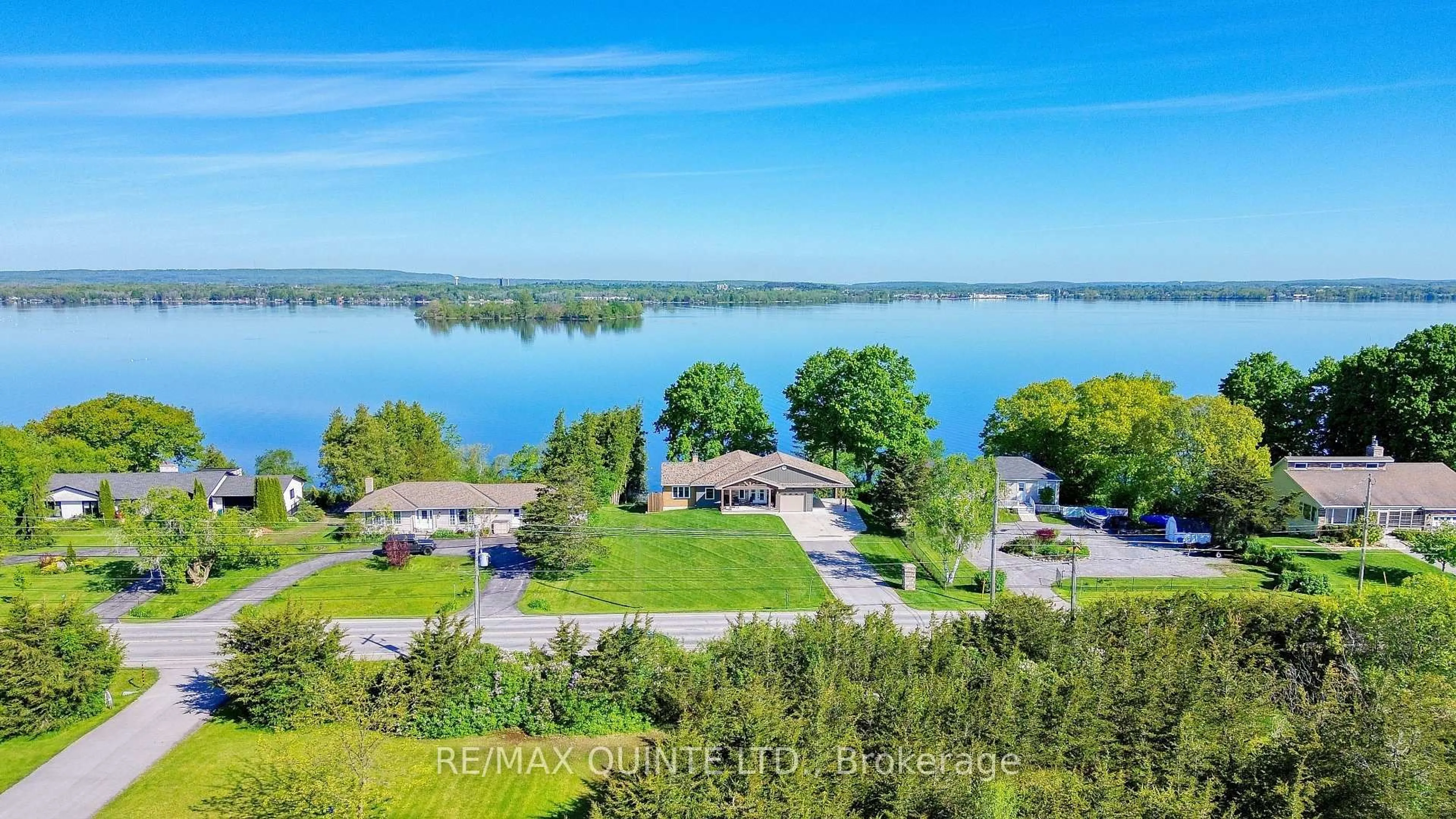 A pic from outside/outdoor area/front of a property/back of a property/a pic from drone, water/lake/river/ocean view for 3400 County Road 3, Prince Edward County Ontario K0K 1L0