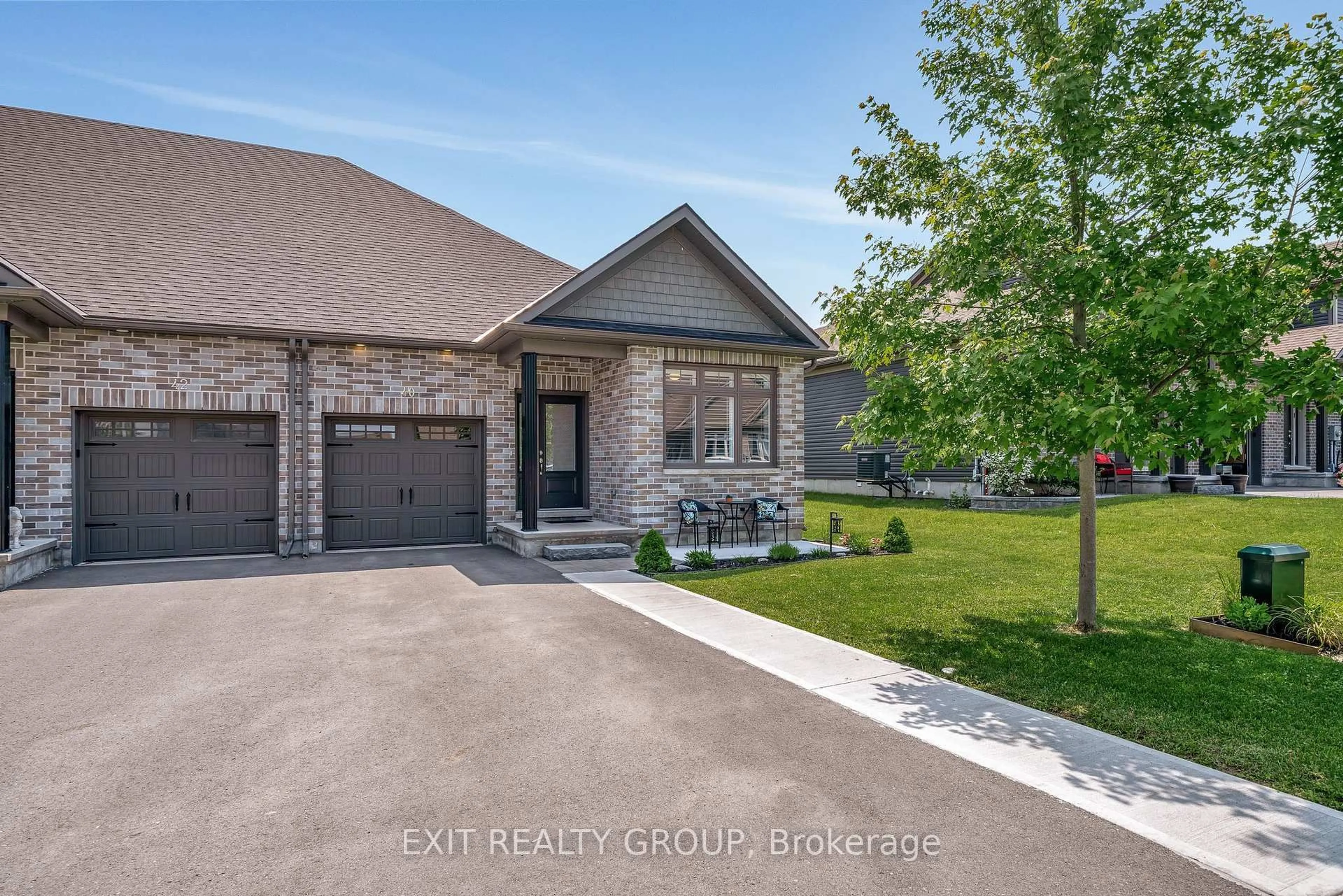 Home with brick exterior material, street for 40 Curtis St, Prince Edward County Ontario K0K 2T0