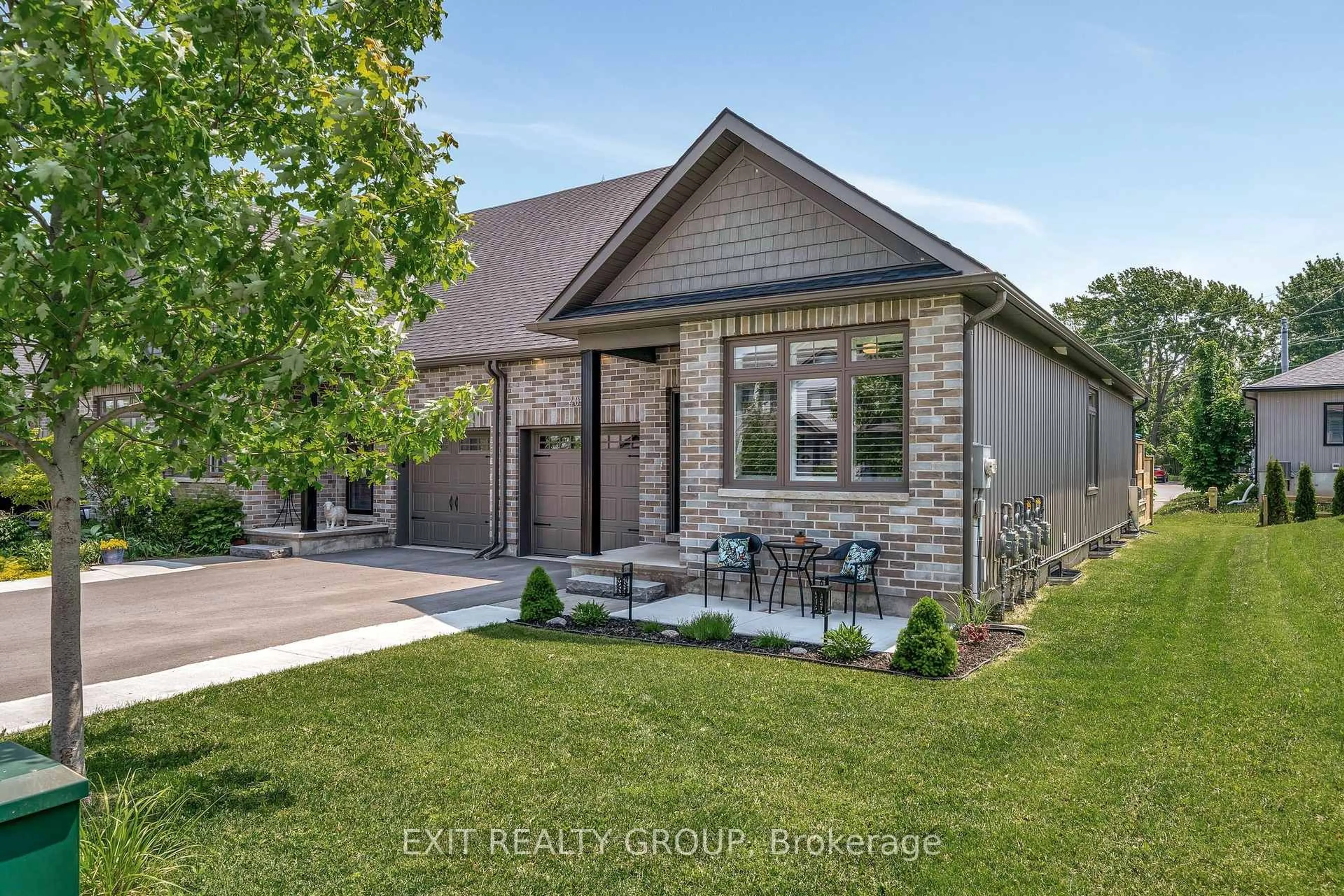 Home with brick exterior material, street for 40 Curtis St, Prince Edward County Ontario K0K 2T0
