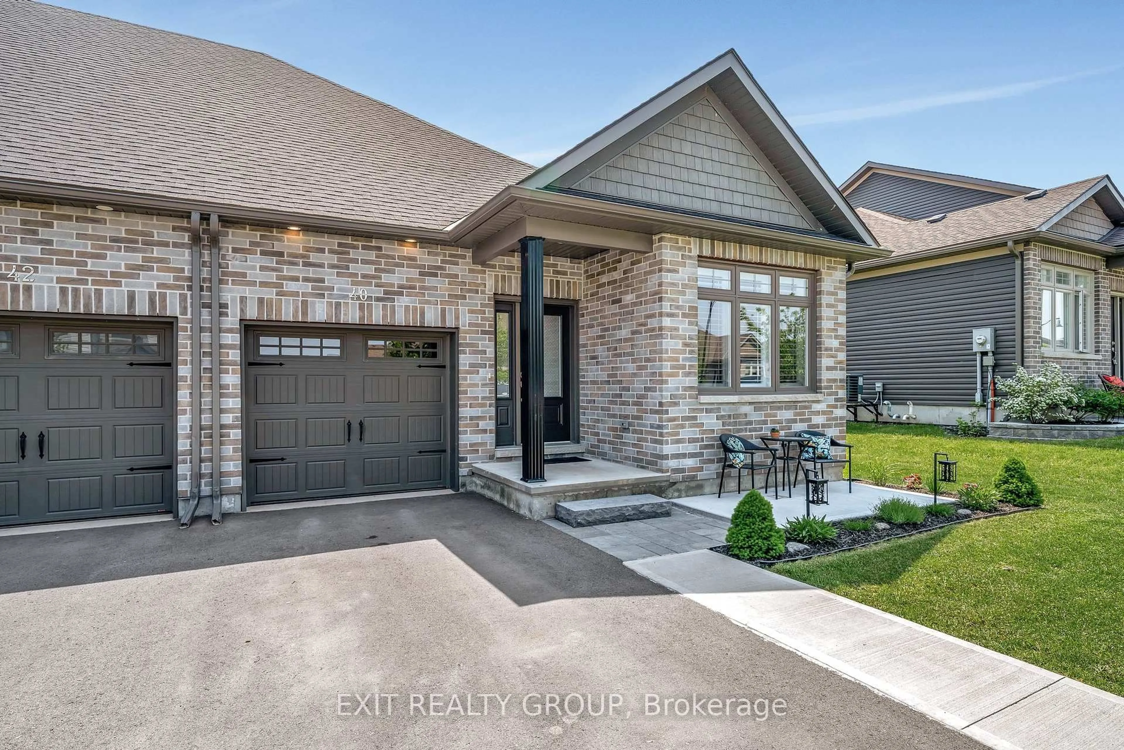Home with brick exterior material, street for 40 Curtis St, Prince Edward County Ontario K0K 2T0