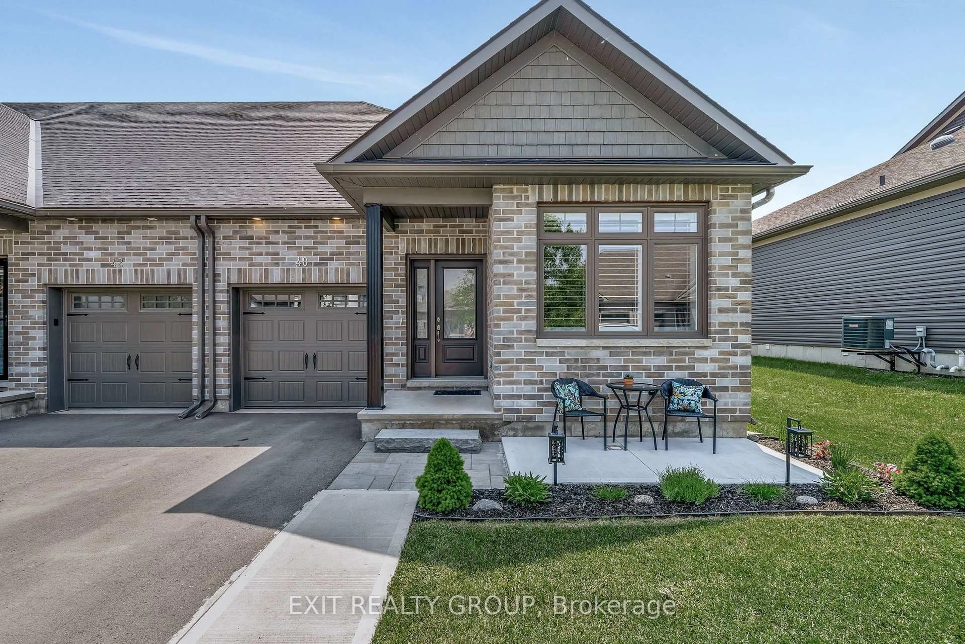 Home with brick exterior material, street for 40 Curtis St, Prince Edward County Ontario K0K 2T0