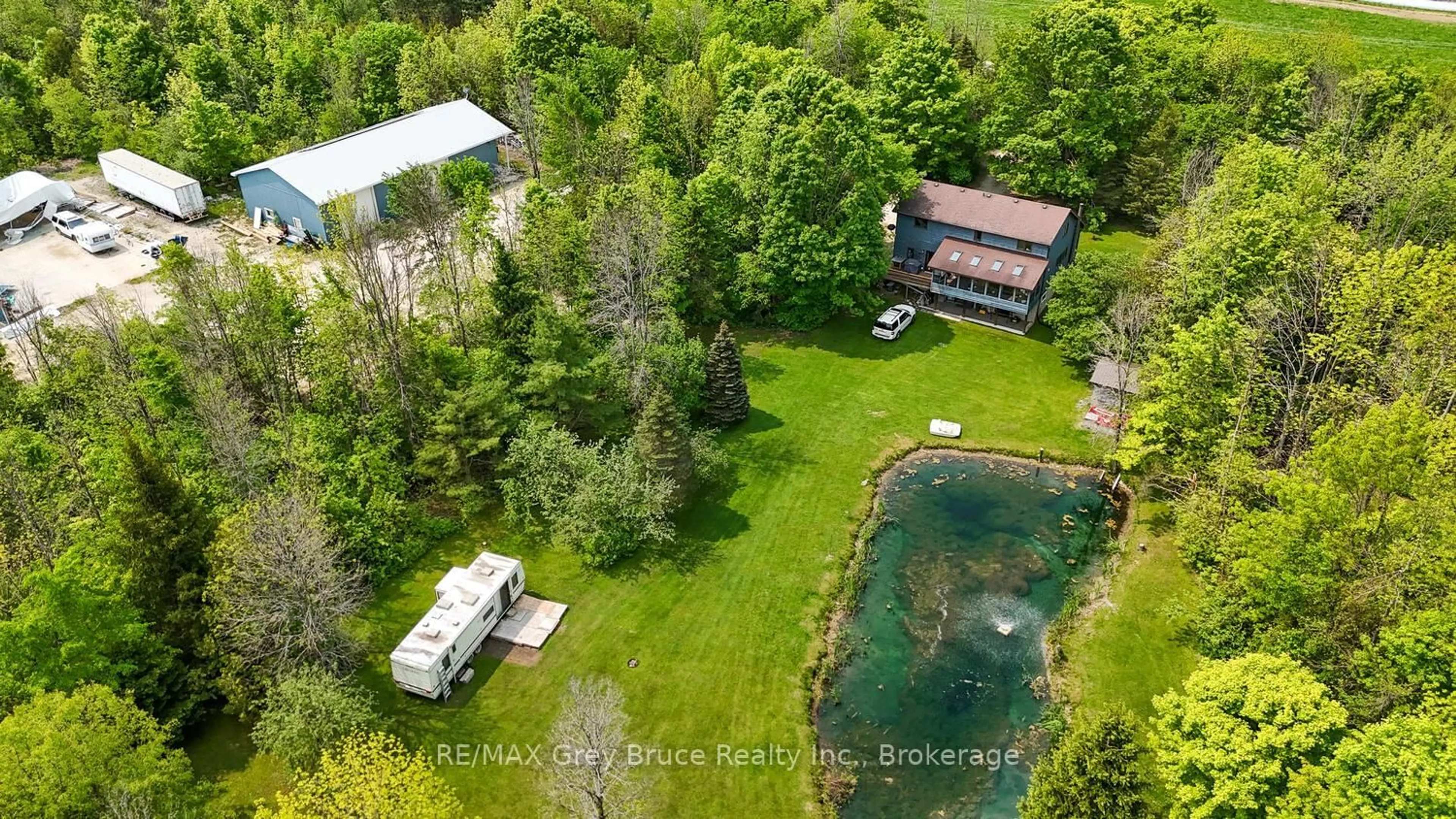 A pic from outside/outdoor area/front of a property/back of a property/a pic from drone, water/lake/river/ocean view for 1033 Bruce Road 9, South Bruce Peninsula Ontario N0H 2T0