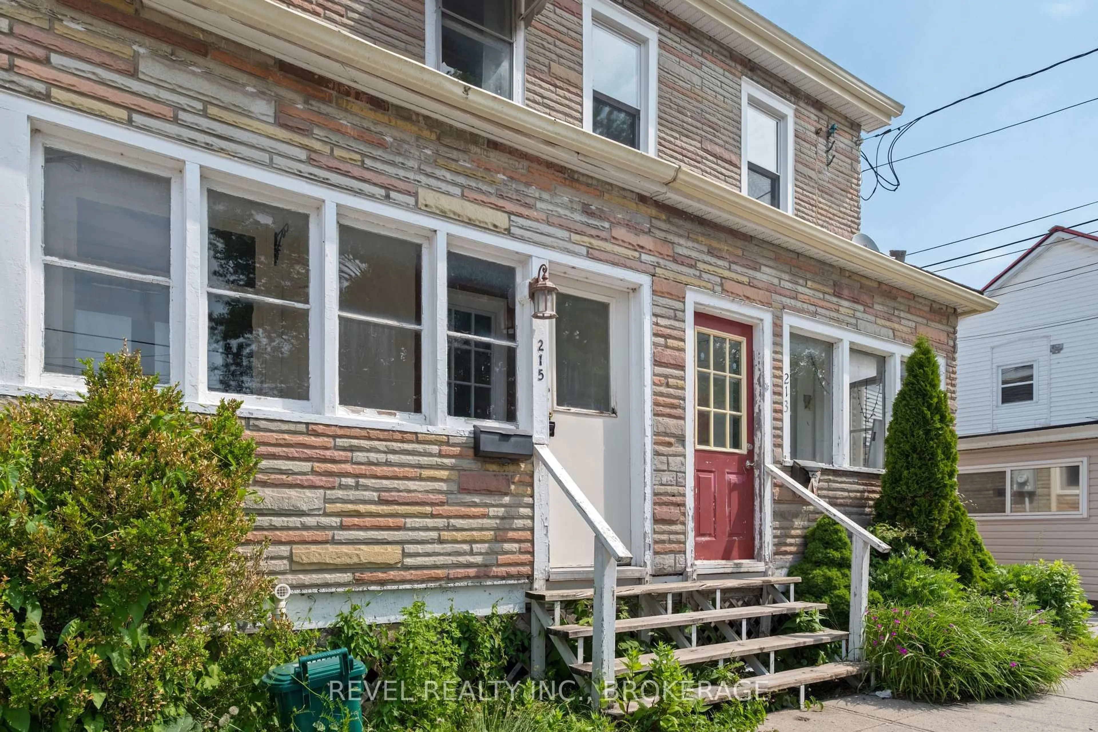 Home with brick exterior material, street for 215 Earl St, Kingston Ontario K7L 2H6