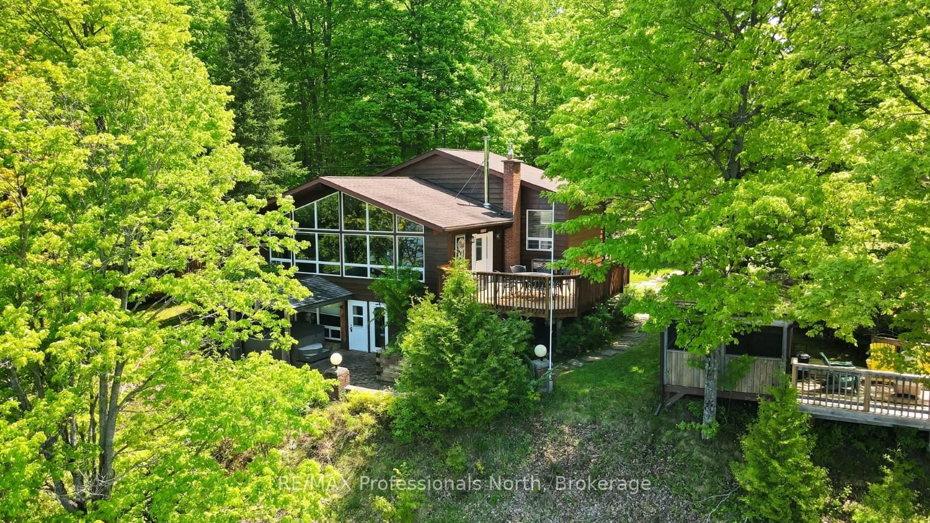 A pic from outside/outdoor area/front of a property/back of a property/a pic from drone, forest/trees view for 1943 Essonville Line, Highlands East Ontario K0L 2Y0