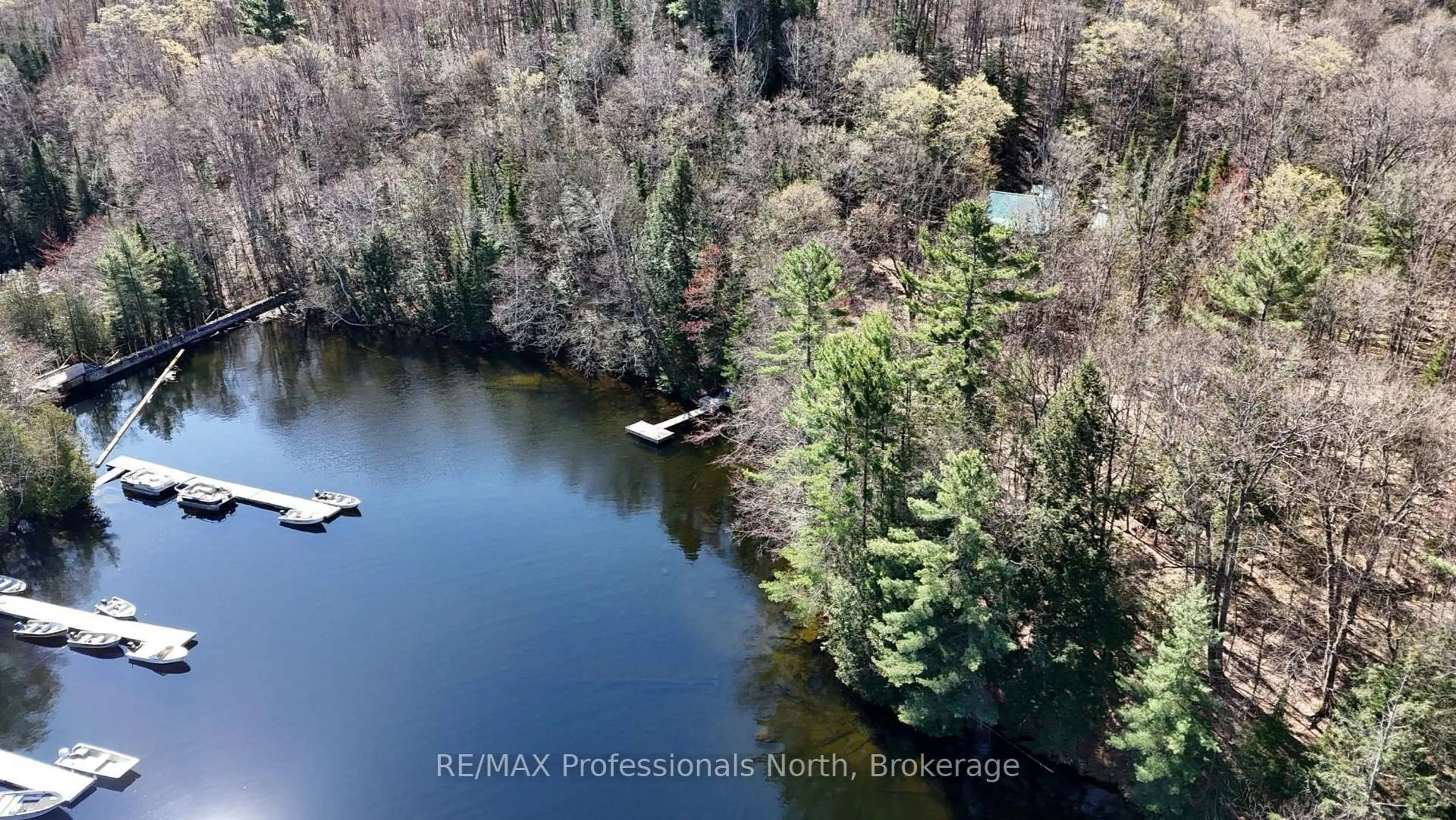 A pic from outside/outdoor area/front of a property/back of a property/a pic from drone, water/lake/river/ocean view for 10019 WOA Redstone Lake, Dysart et al Ontario K0M 1S0