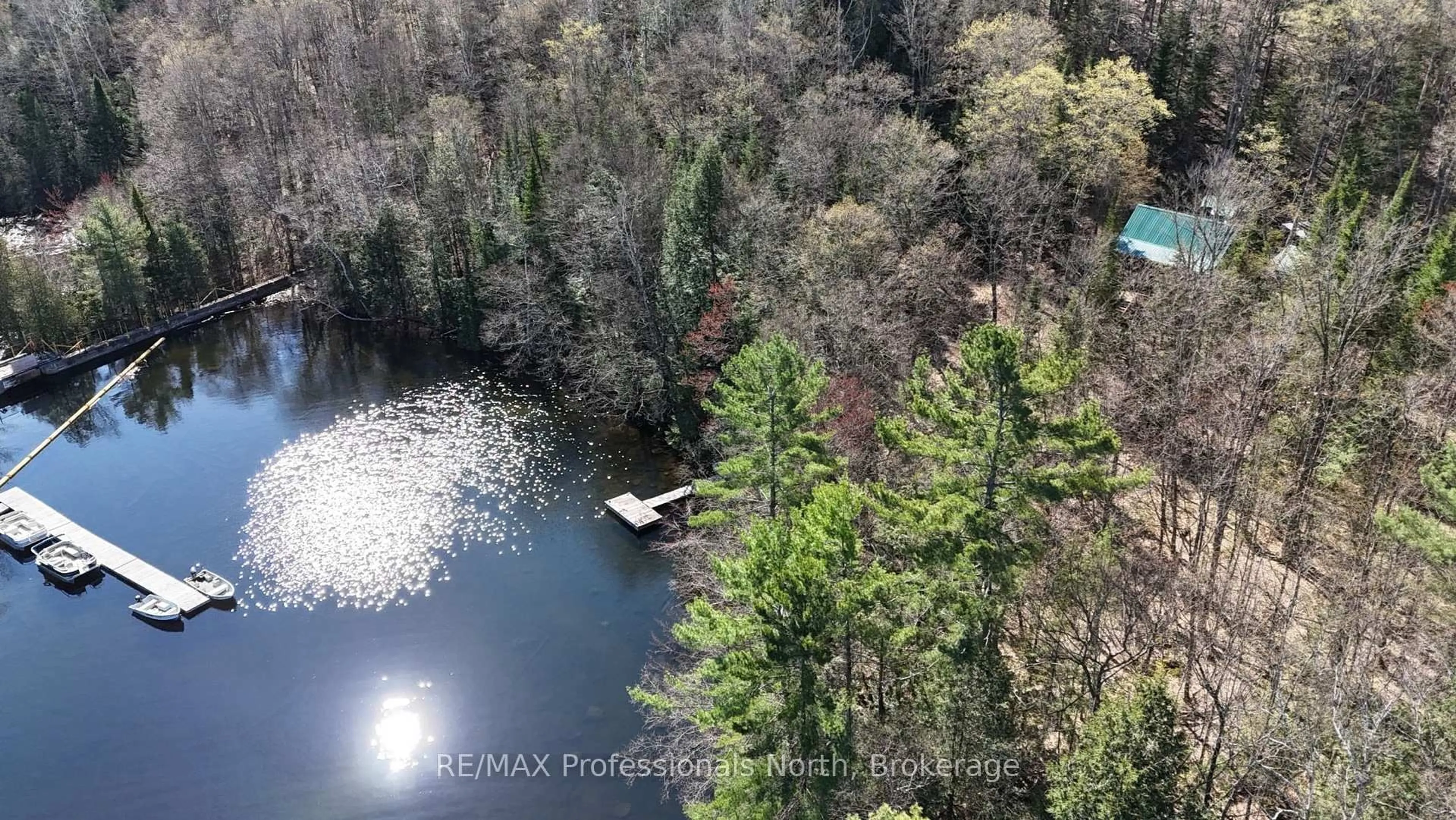 A pic from outside/outdoor area/front of a property/back of a property/a pic from drone, water/lake/river/ocean view for 10019 WOA Redstone Lake, Dysart et al Ontario K0M 1S0
