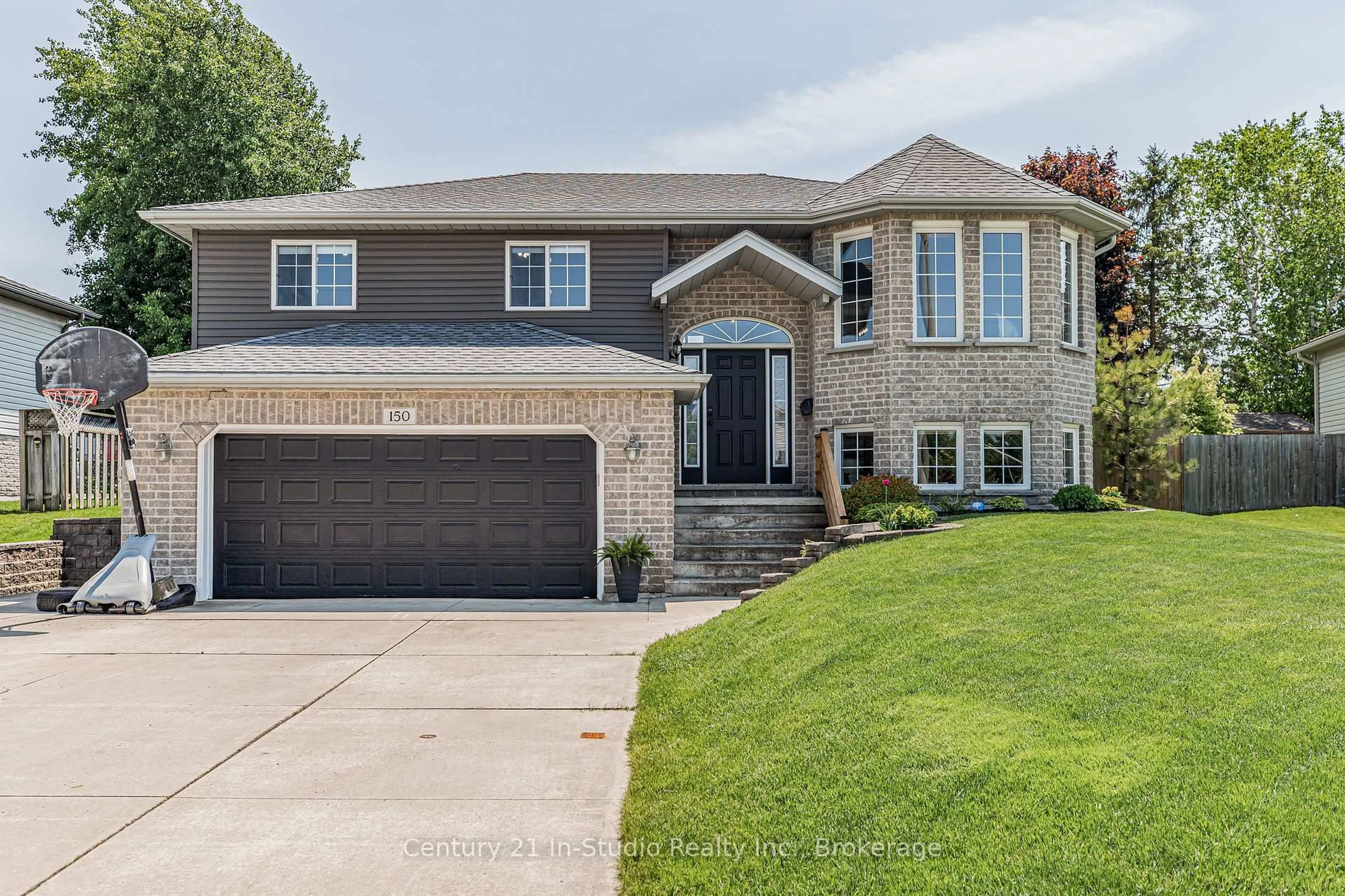 Home with brick exterior material, street for 150 16th Avenue Cres, Hanover Ontario N4N 3V3