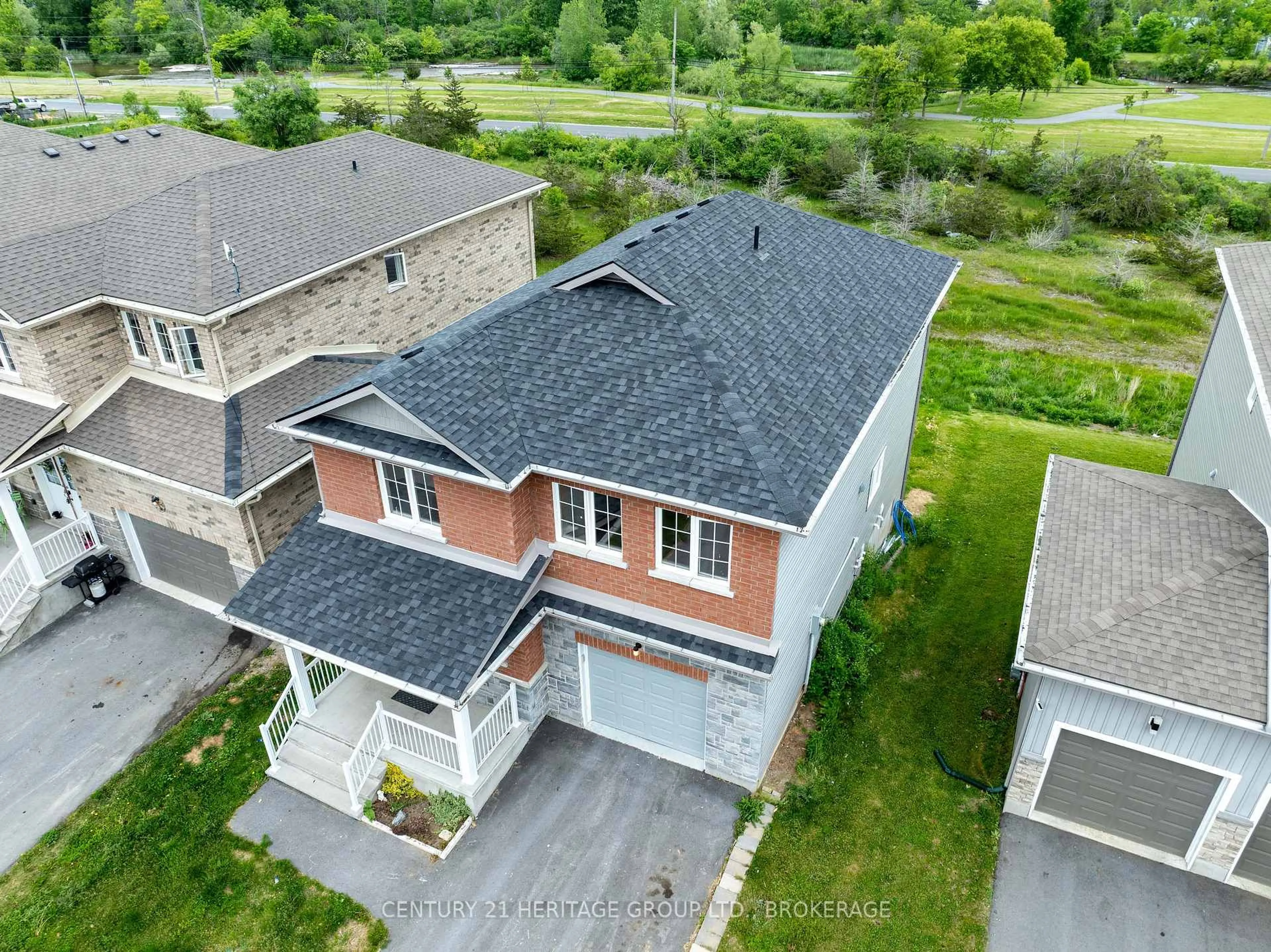 A pic from outside/outdoor area/front of a property/back of a property/a pic from drone, unknown for 104 Brennan Cres, Bissett Creek Ontario K0H 2H0