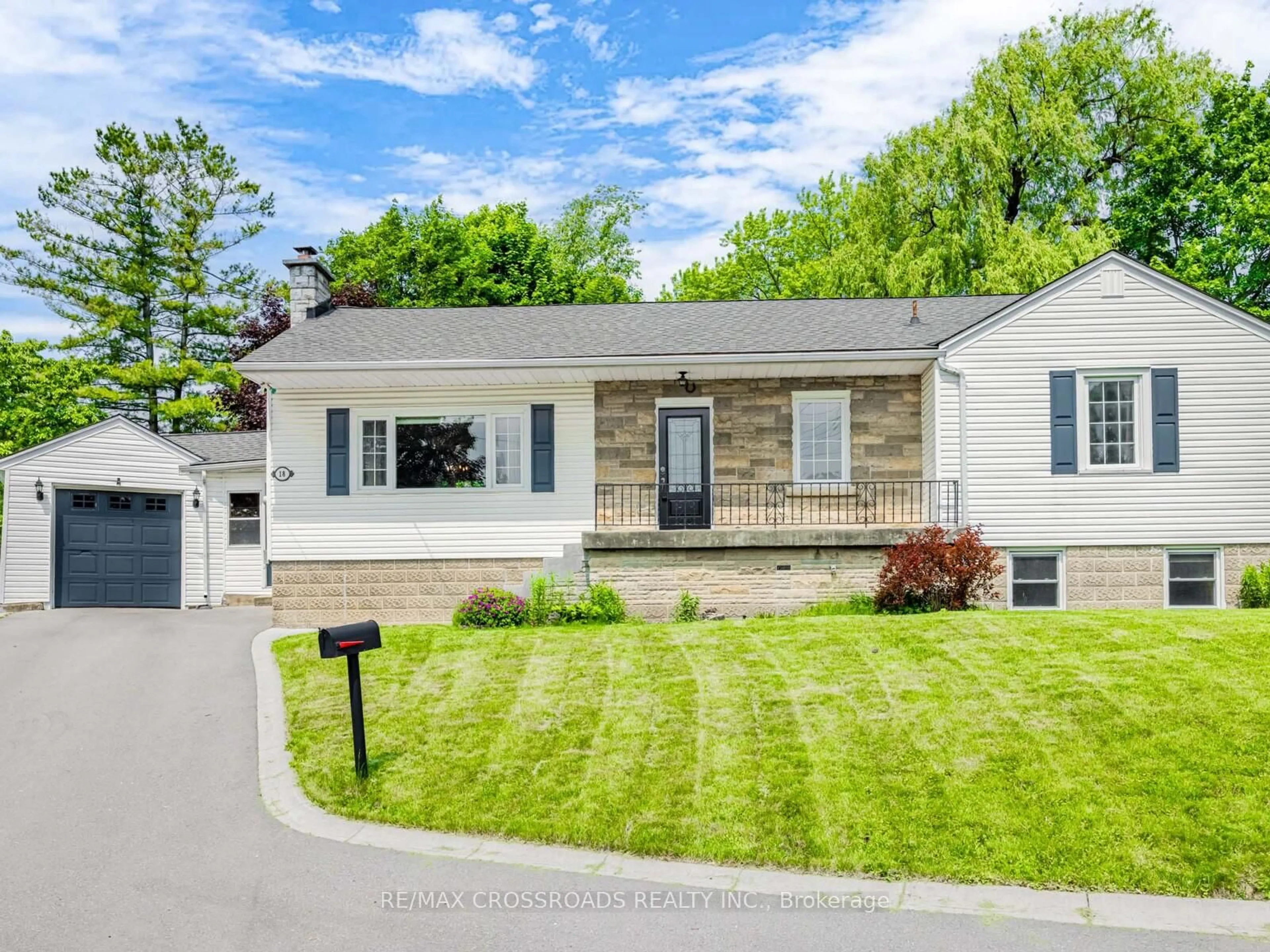Home with vinyl exterior material, street for 18 Underhill Ave, Hamilton Ontario L9H 1S3