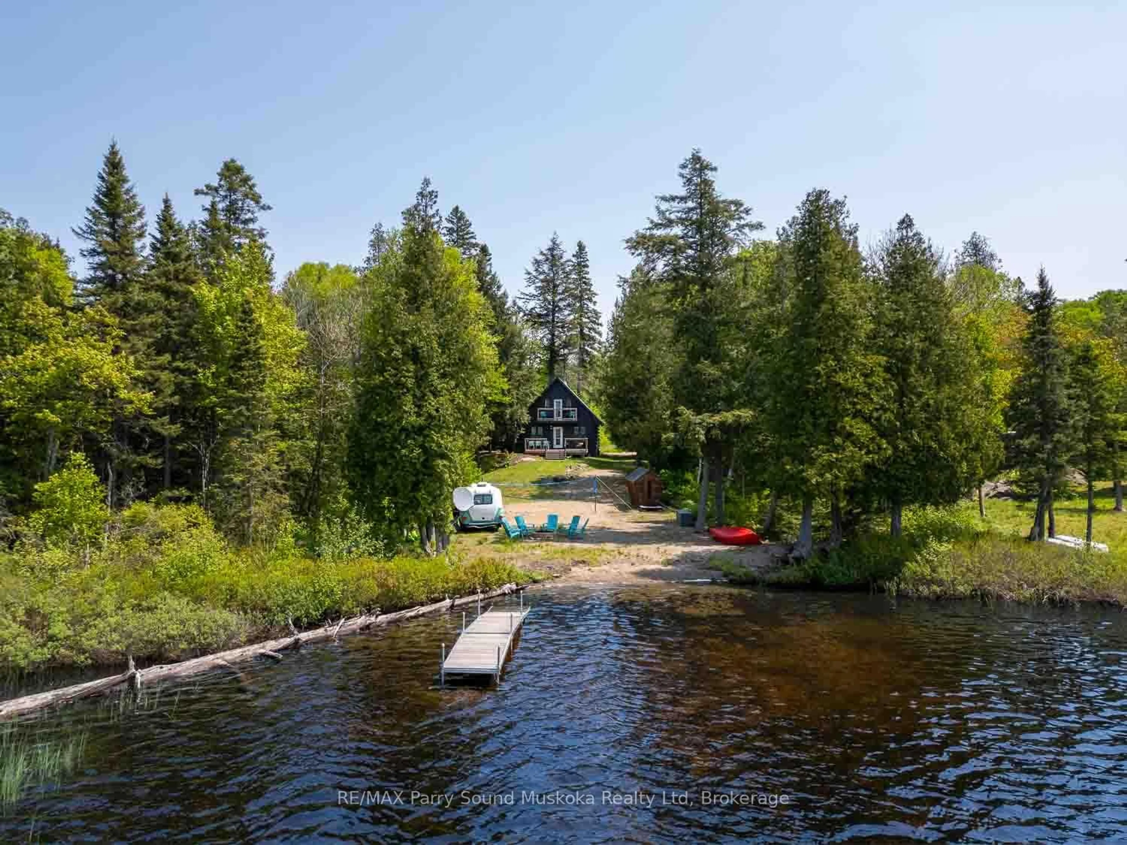 A pic from outside/outdoor area/front of a property/back of a property/a pic from drone, water/lake/river/ocean view for 95 Pettit Lane, Kearney Ontario P0A 1M0